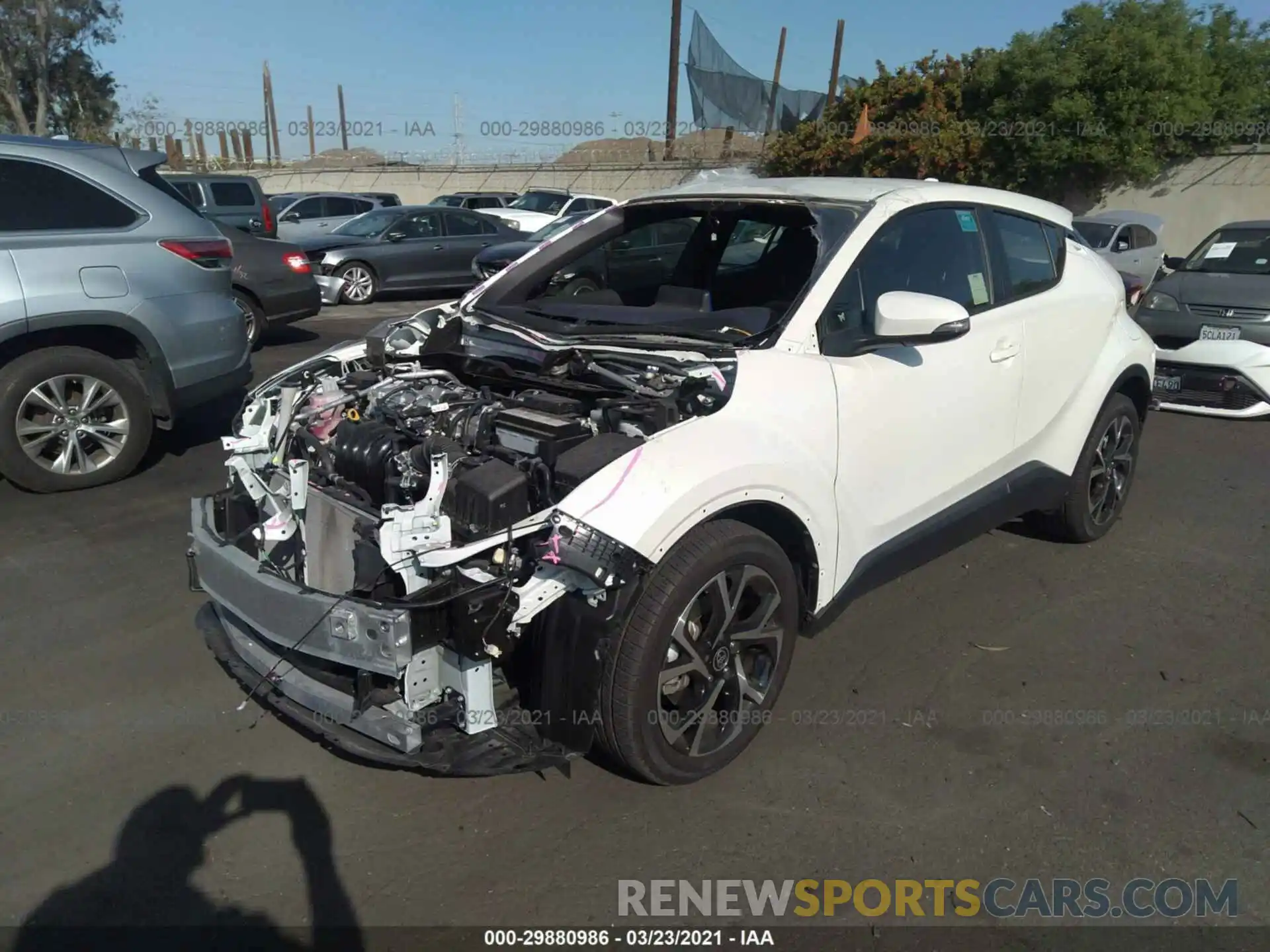 2 Photograph of a damaged car JTNKHMBX2L1074520 TOYOTA C-HR 2020