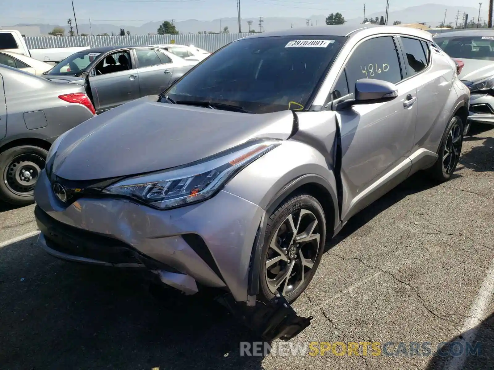 2 Photograph of a damaged car JTNKHMBX6L1091708 TOYOTA C-HR 2020