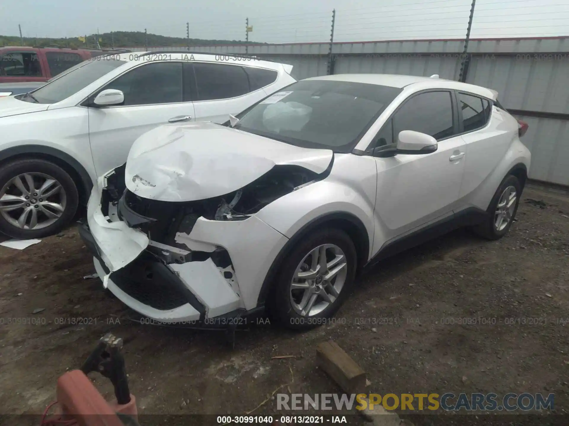 2 Photograph of a damaged car JTNKHMBX9L1071842 TOYOTA C-HR 2020