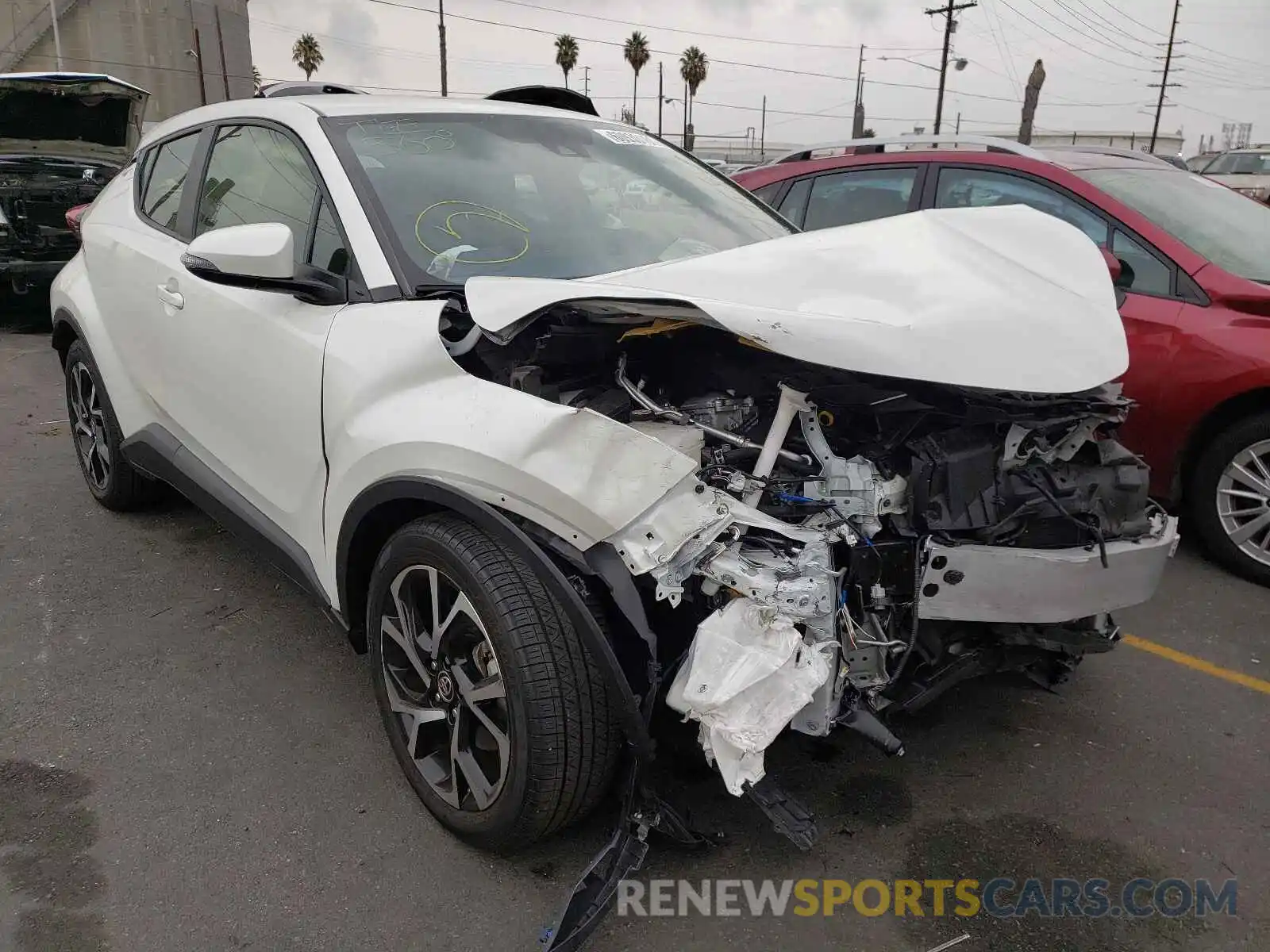 1 Photograph of a damaged car JTNKHMBX9L1084395 TOYOTA C-HR 2020