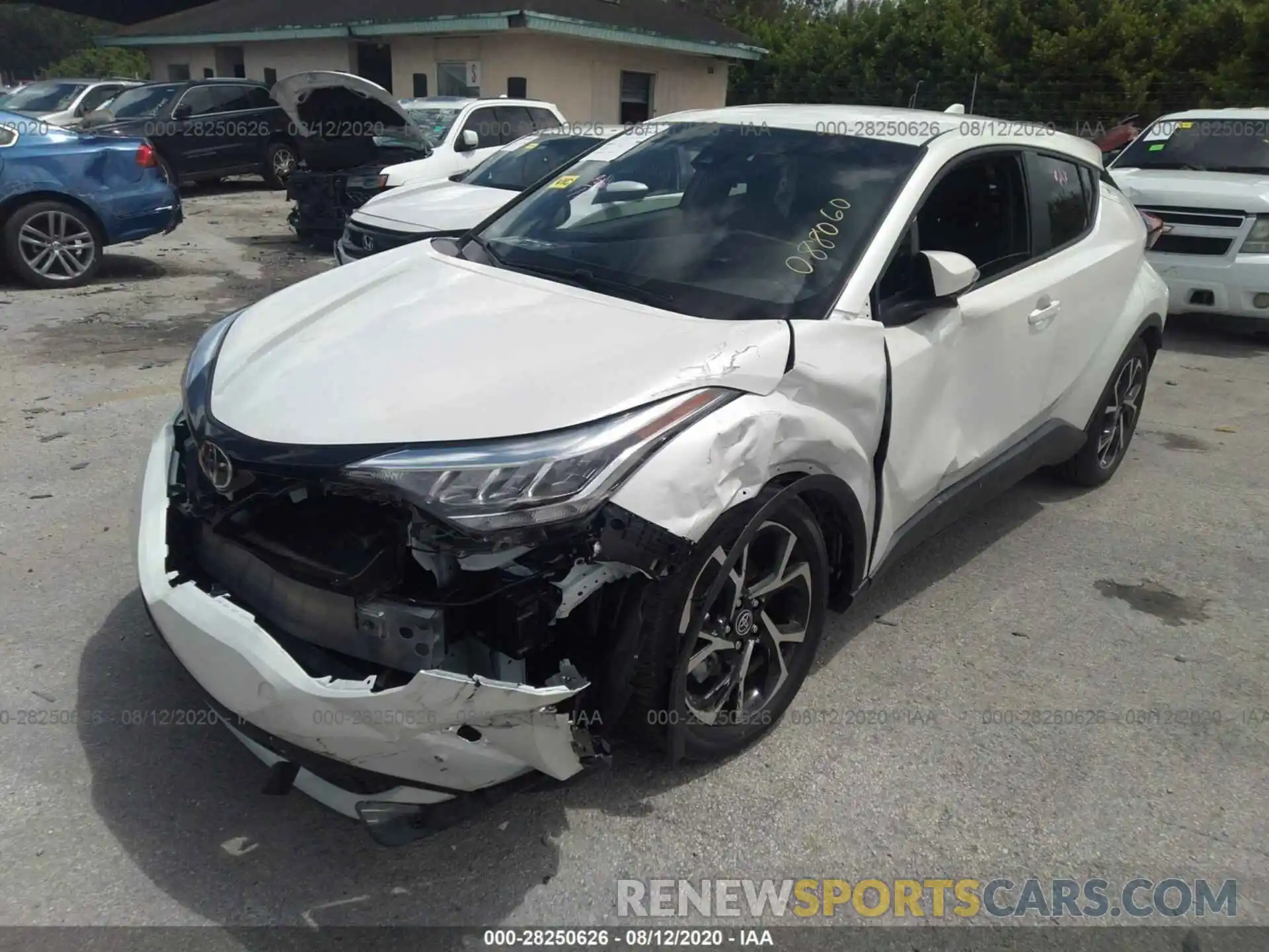 2 Photograph of a damaged car JTNKHMBX9L1088060 TOYOTA C-HR 2020