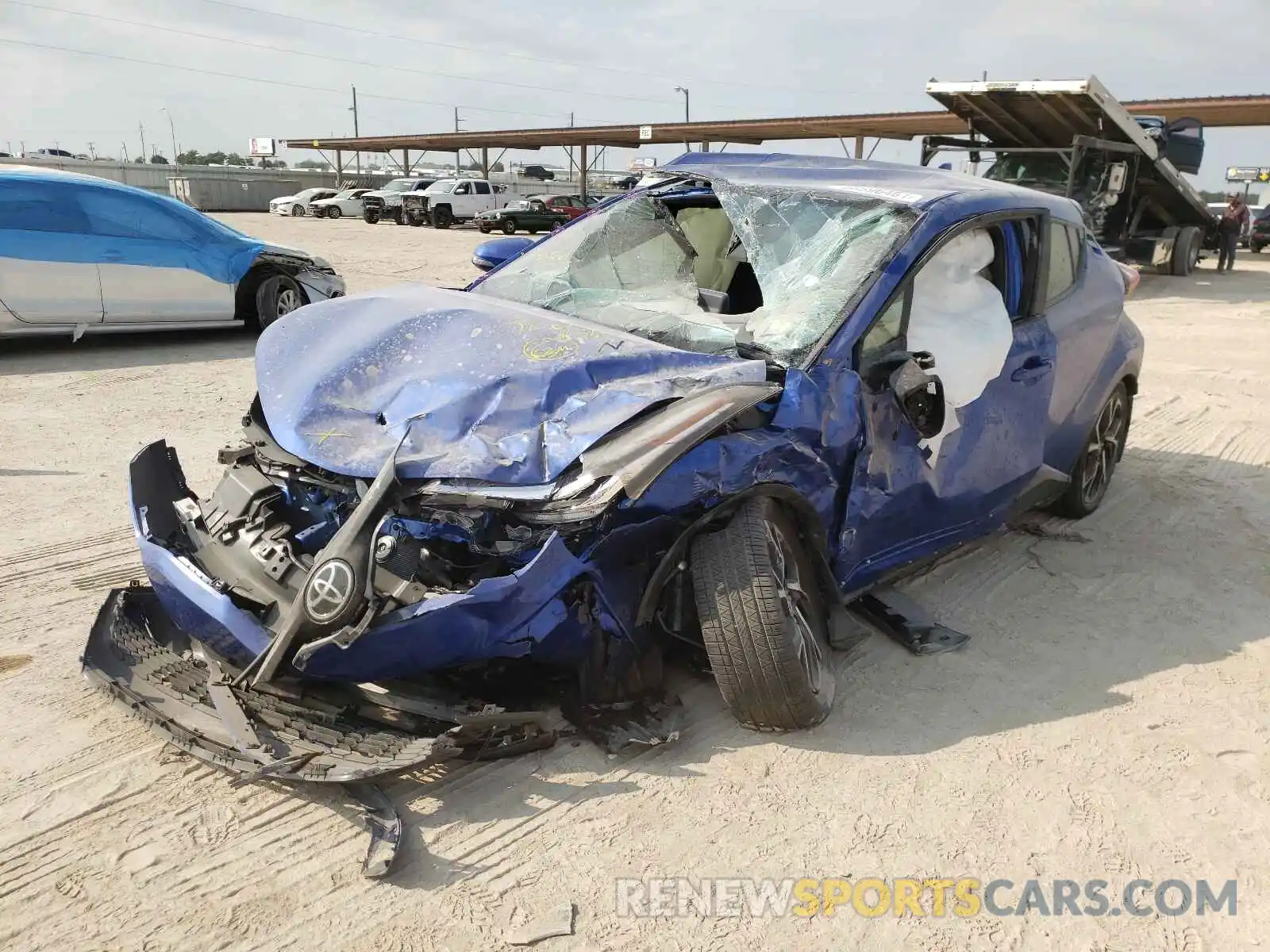 2 Photograph of a damaged car JTNKHMBX0M1110156 TOYOTA C-HR 2021