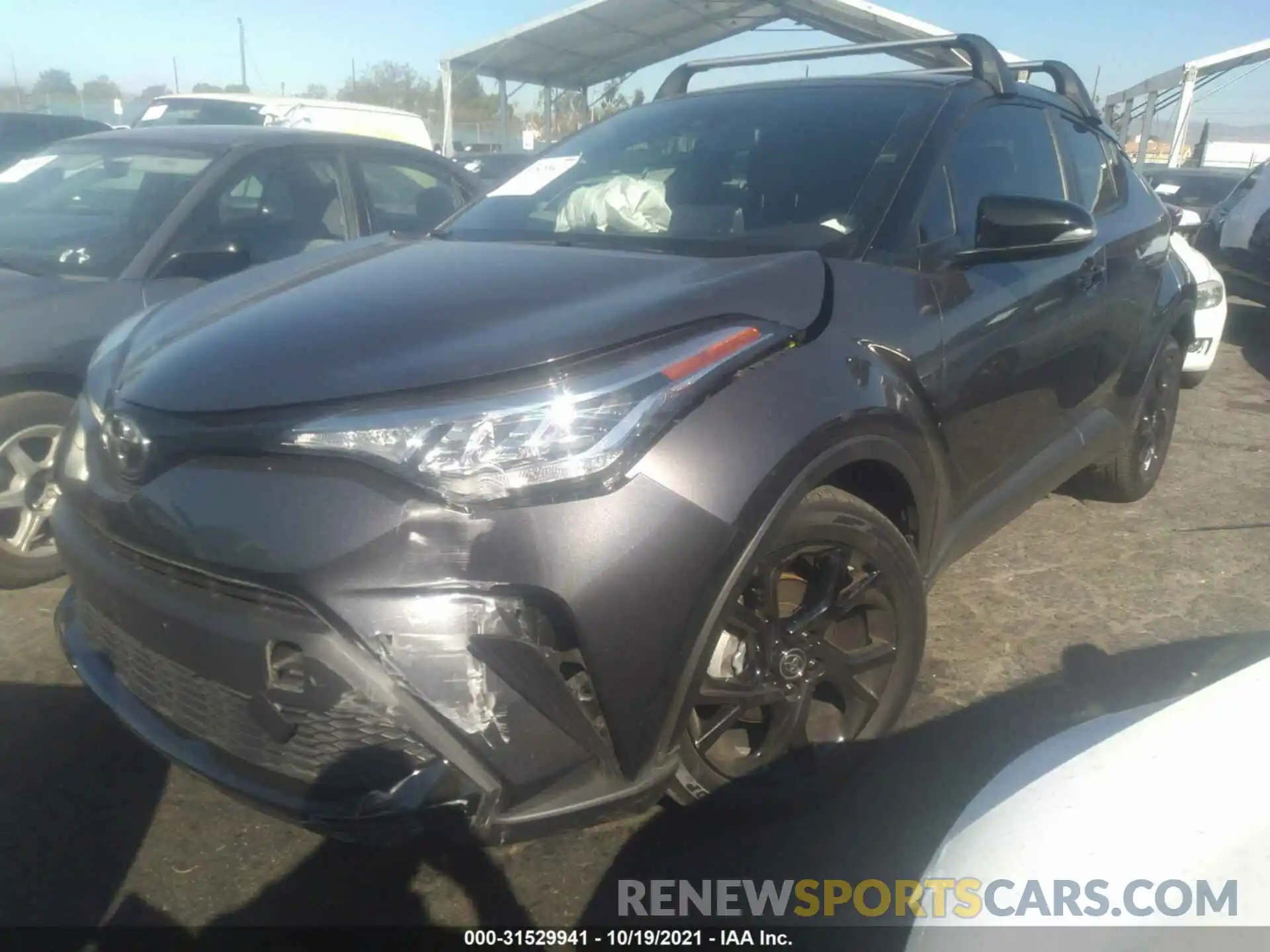 2 Photograph of a damaged car JTNKHMBX1M1099541 TOYOTA C-HR 2021