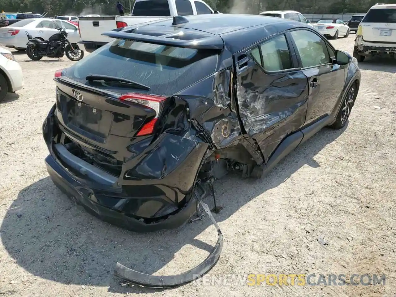 4 Photograph of a damaged car JTNKHMBX1M1117892 TOYOTA C-HR 2021