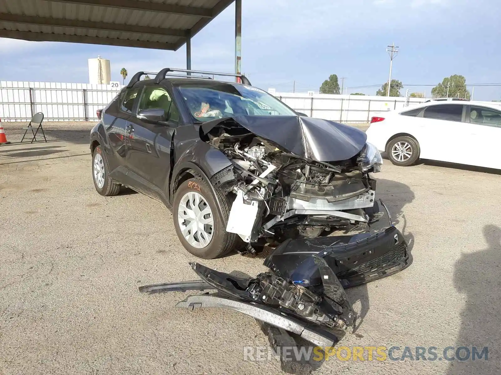 1 Photograph of a damaged car JTNKHMBX1M1120372 TOYOTA C-HR 2021