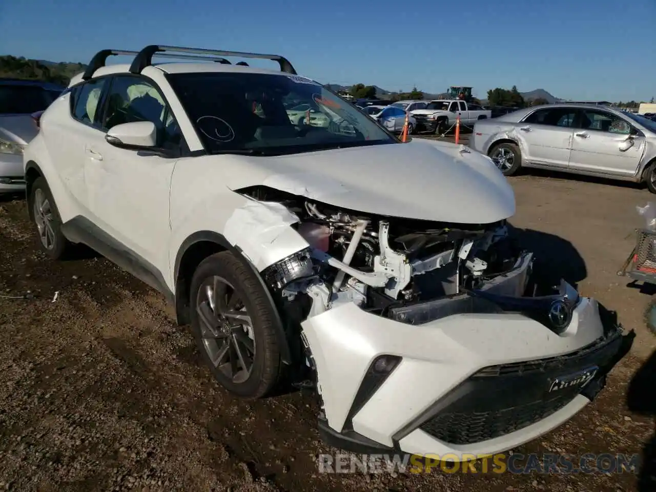 1 Photograph of a damaged car JTNKHMBX1M1122879 TOYOTA C-HR 2021