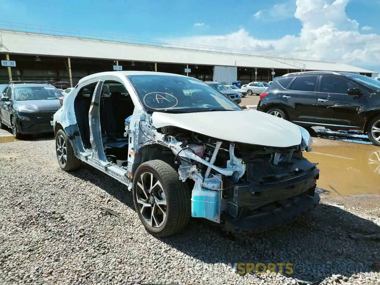 1 Photograph of a damaged car JTNKHMBX4M1107860 TOYOTA C-HR 2021