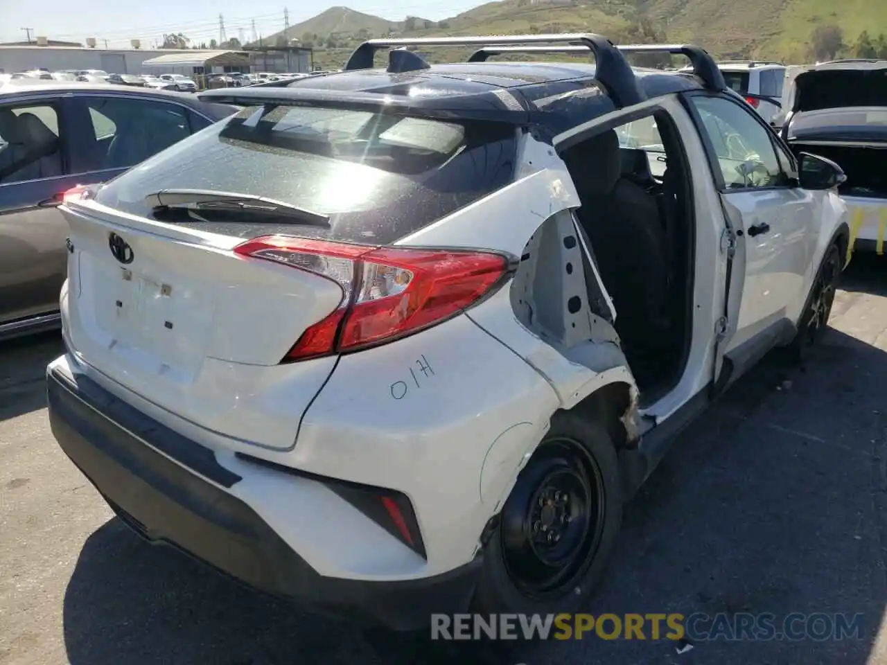 4 Photograph of a damaged car JTNKHMBX4M1120396 TOYOTA C-HR 2021