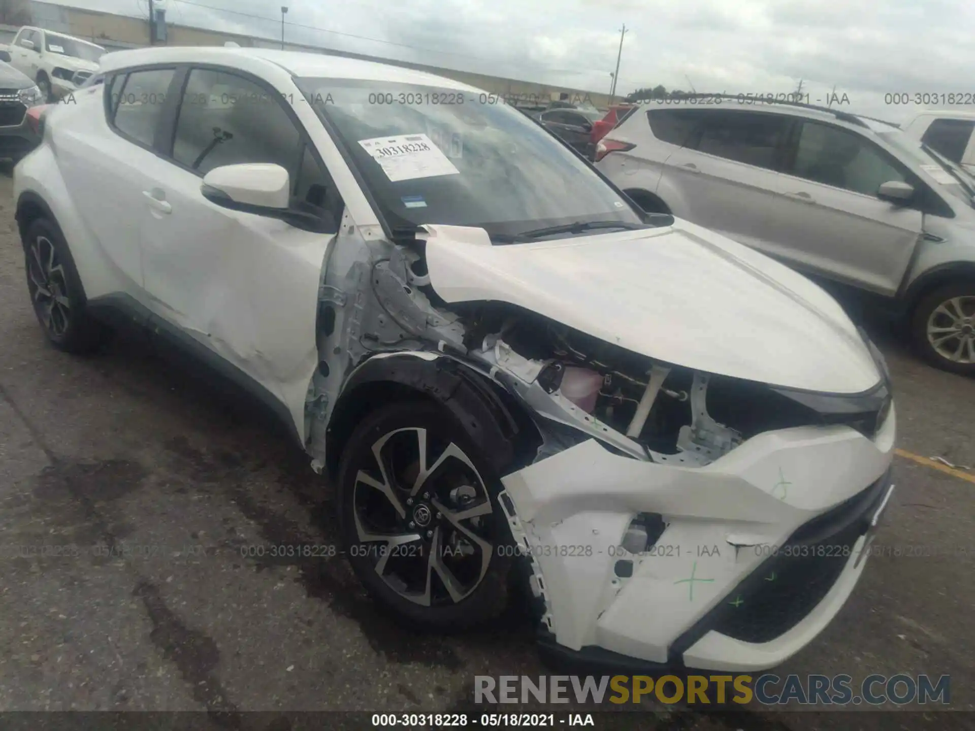 1 Photograph of a damaged car JTNKHMBX5M1112260 TOYOTA C-HR 2021