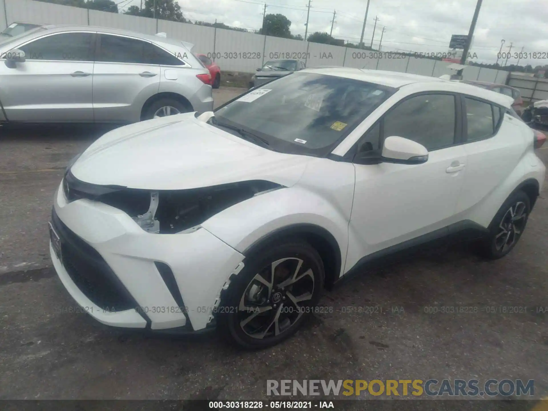 2 Photograph of a damaged car JTNKHMBX5M1112260 TOYOTA C-HR 2021