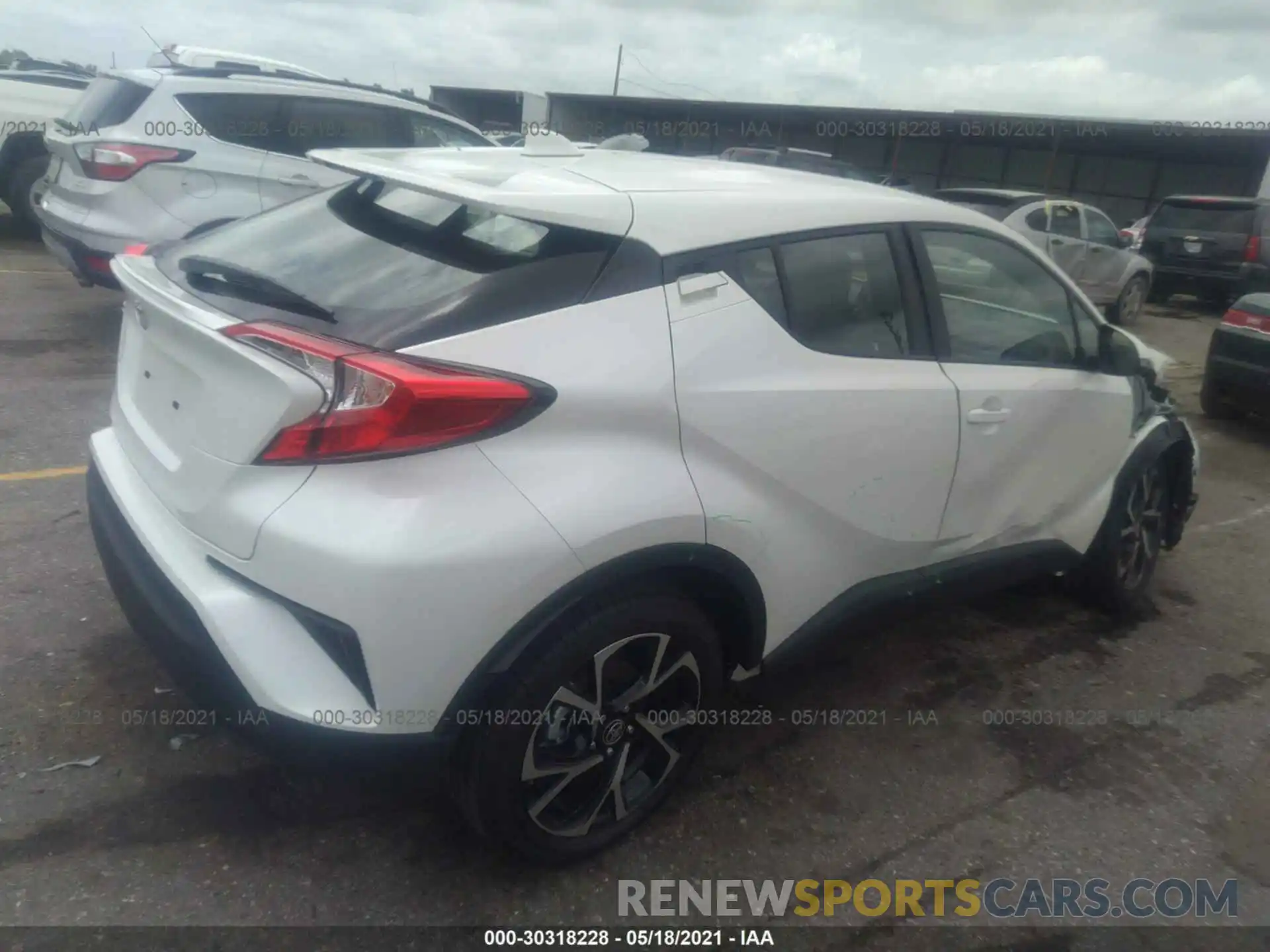 4 Photograph of a damaged car JTNKHMBX5M1112260 TOYOTA C-HR 2021