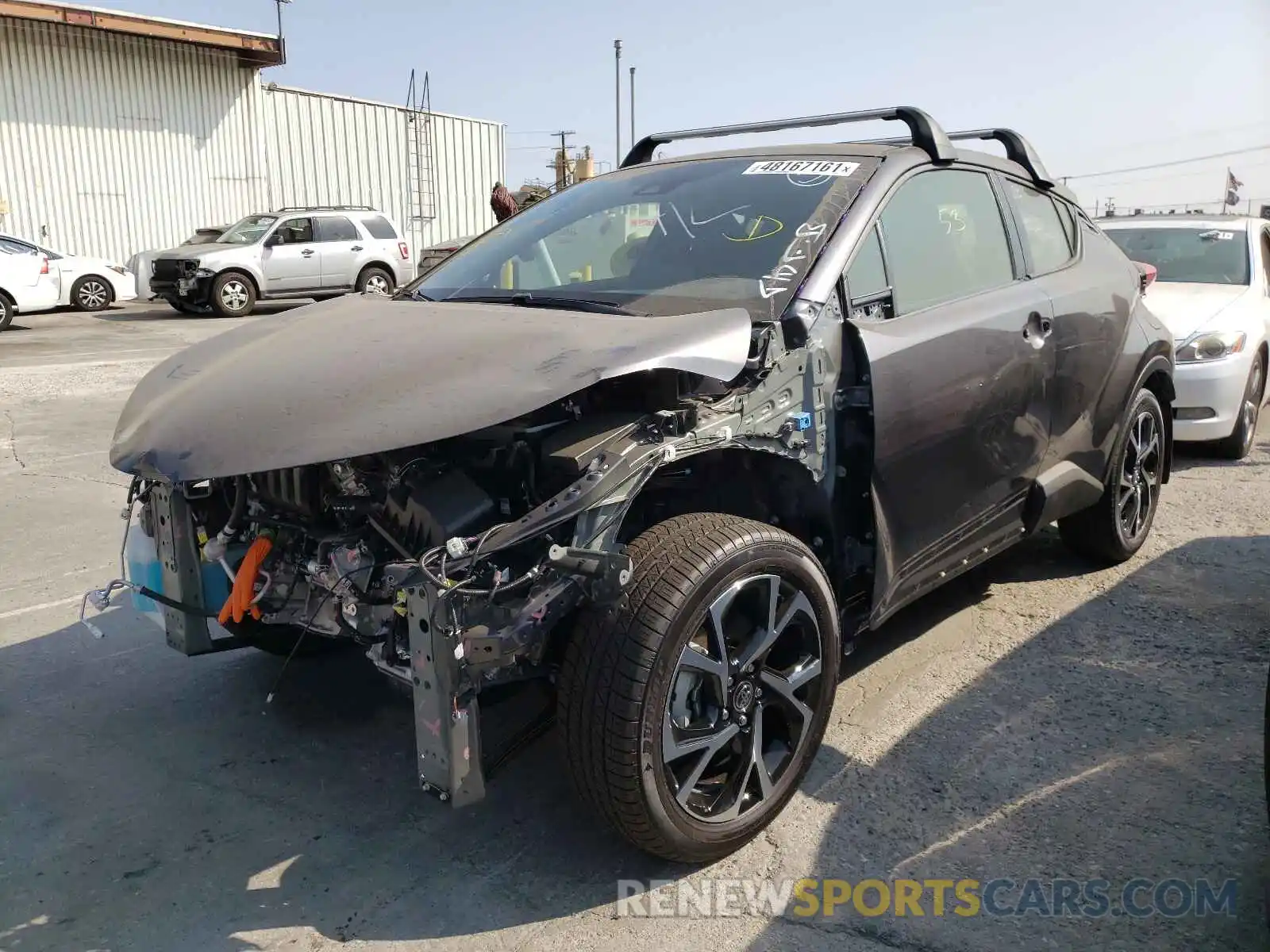 2 Photograph of a damaged car JTNKHMBX7M1122000 TOYOTA C-HR 2021