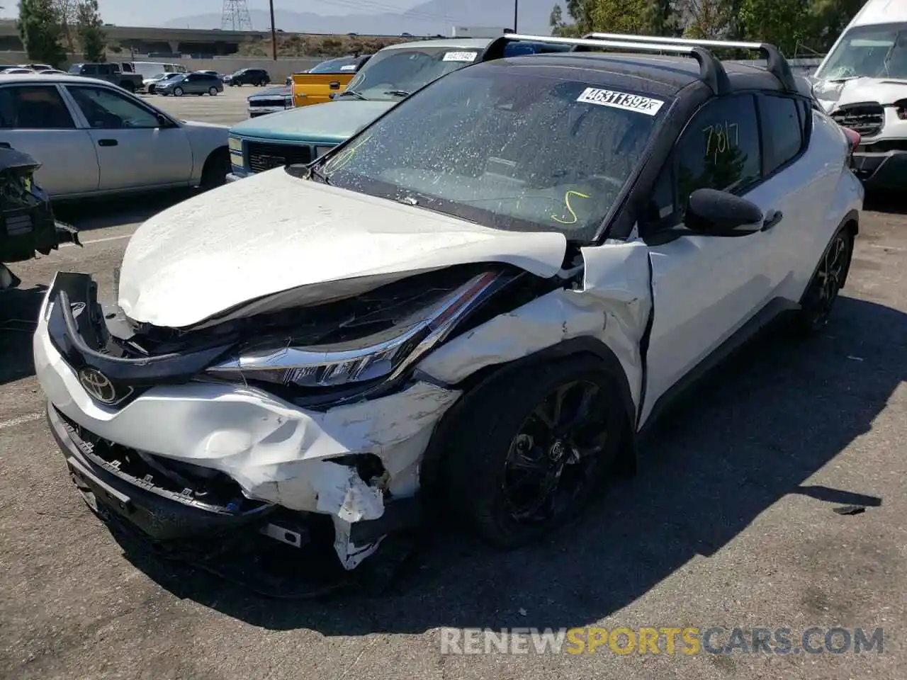 2 Photograph of a damaged car JTNKHMBX7M1125110 TOYOTA C-HR 2021