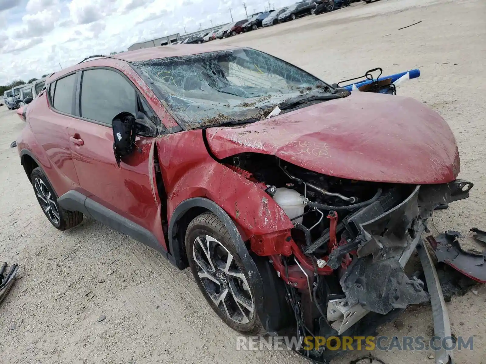 1 Photograph of a damaged car JTNKHMBX8M1107893 TOYOTA C-HR 2021