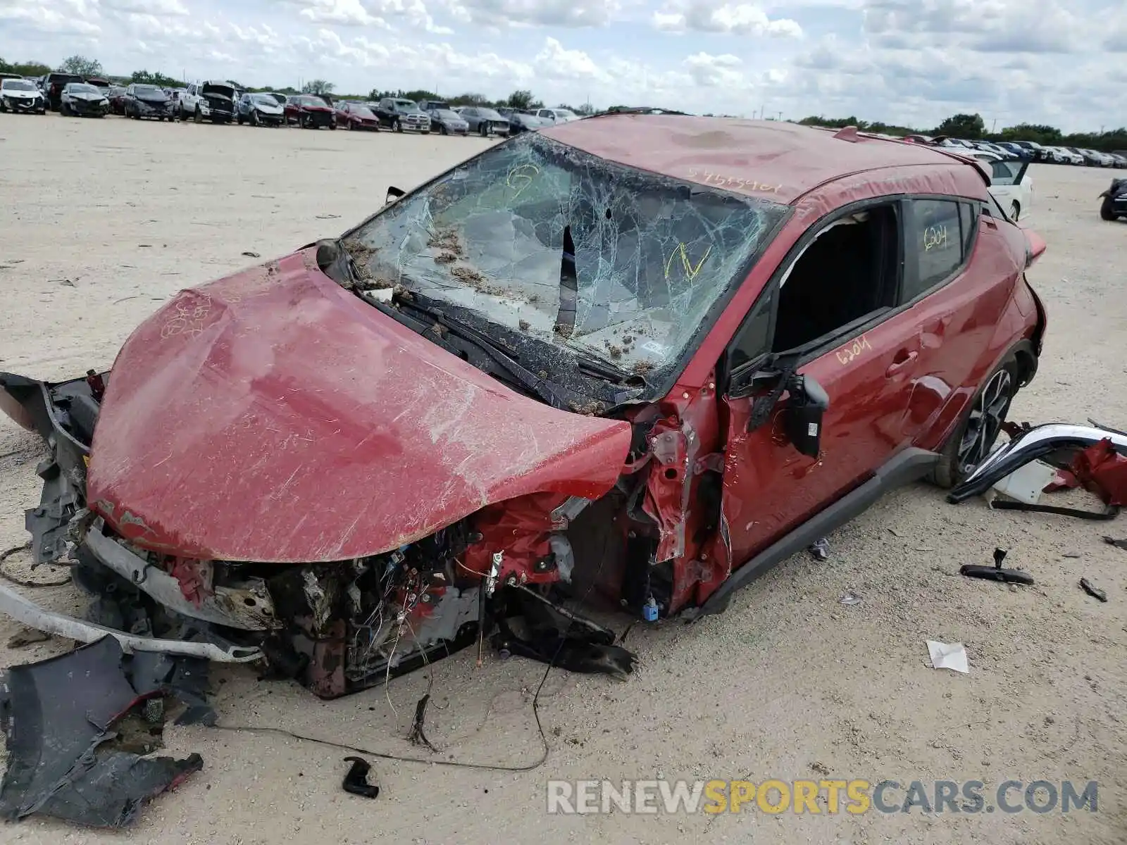 2 Photograph of a damaged car JTNKHMBX8M1107893 TOYOTA C-HR 2021