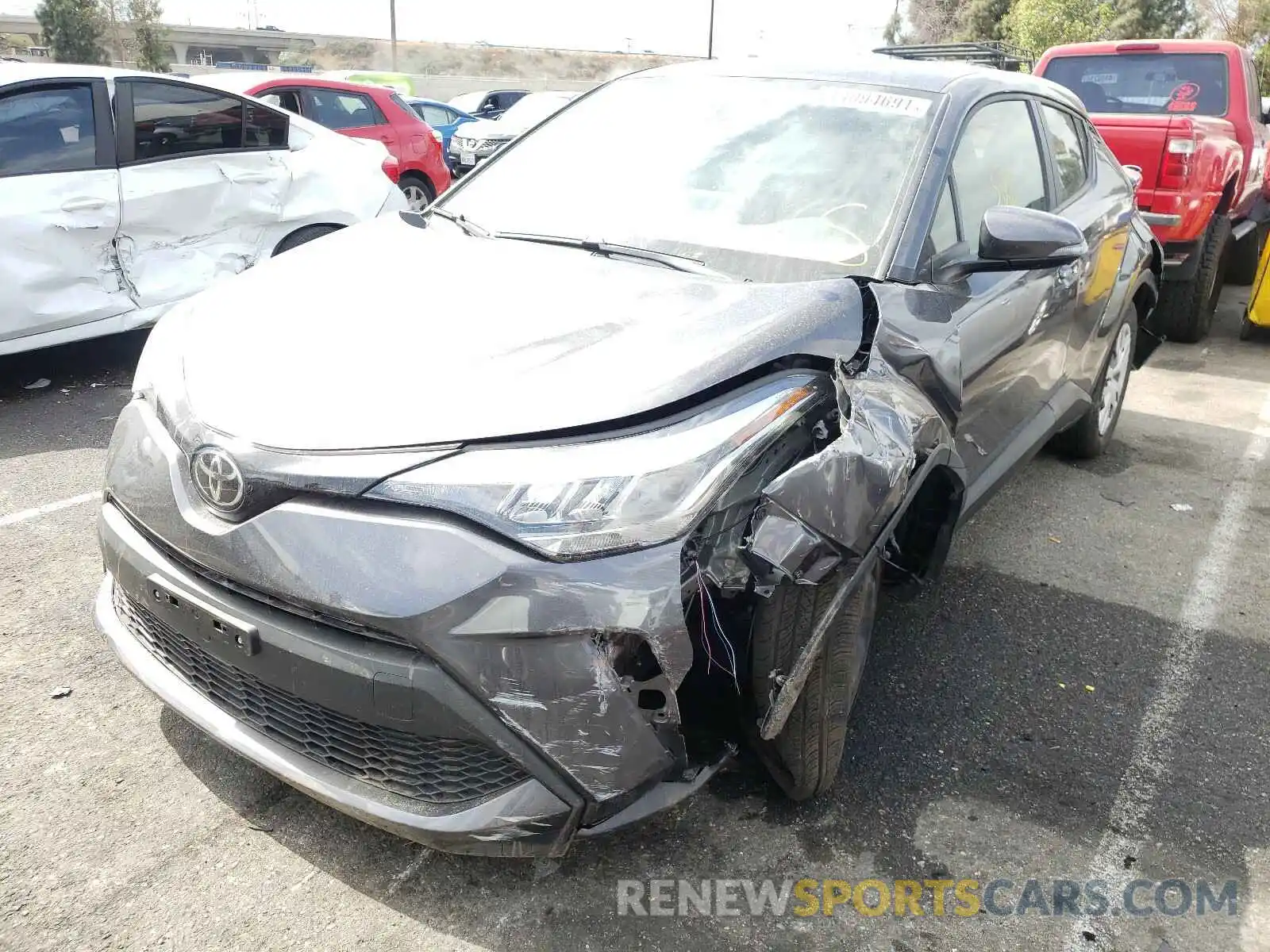 2 Photograph of a damaged car JTNKHMBX9M1095057 TOYOTA C-HR 2021