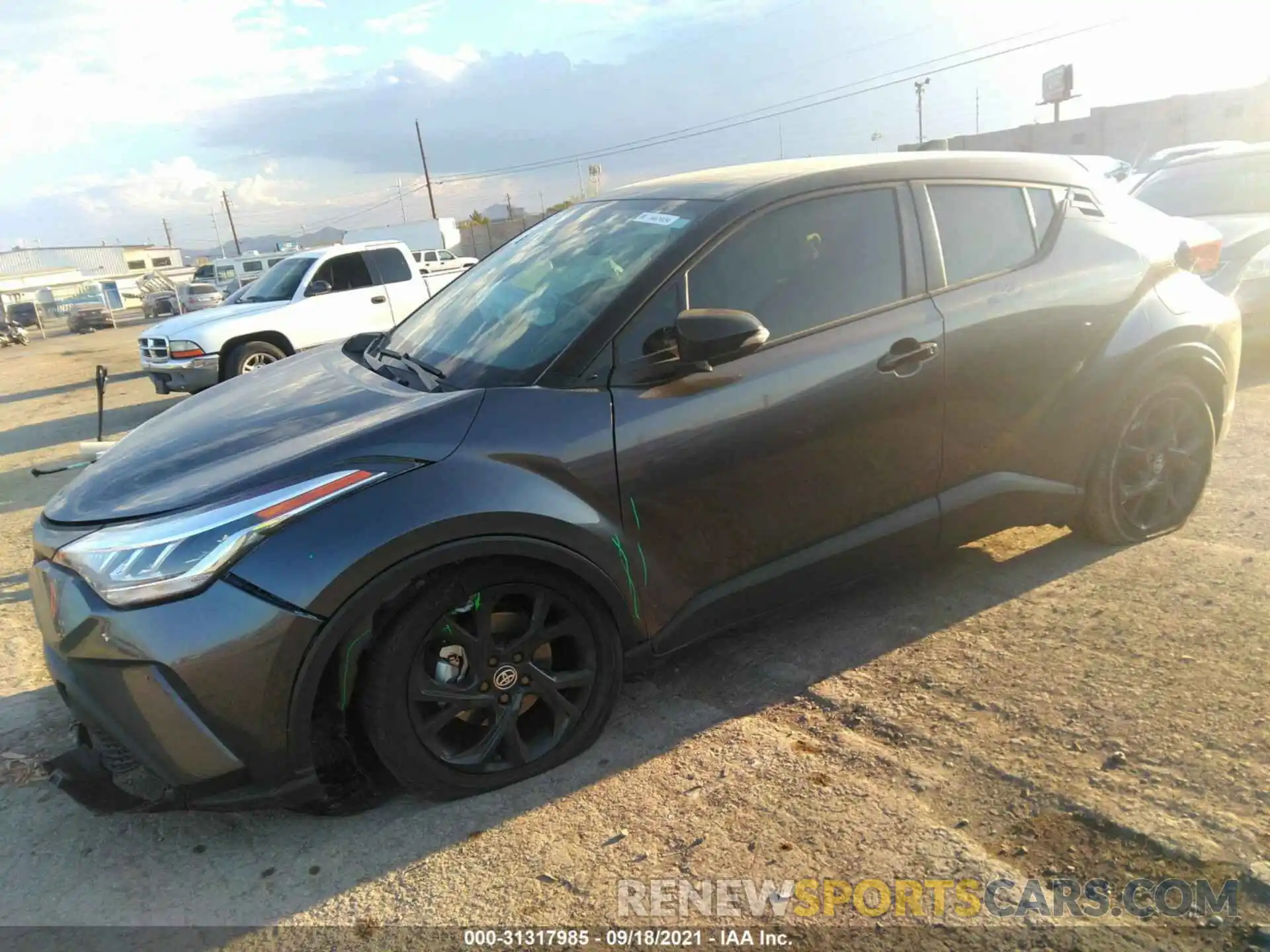 2 Photograph of a damaged car JTNKHMBX9M1121494 TOYOTA C-HR 2021