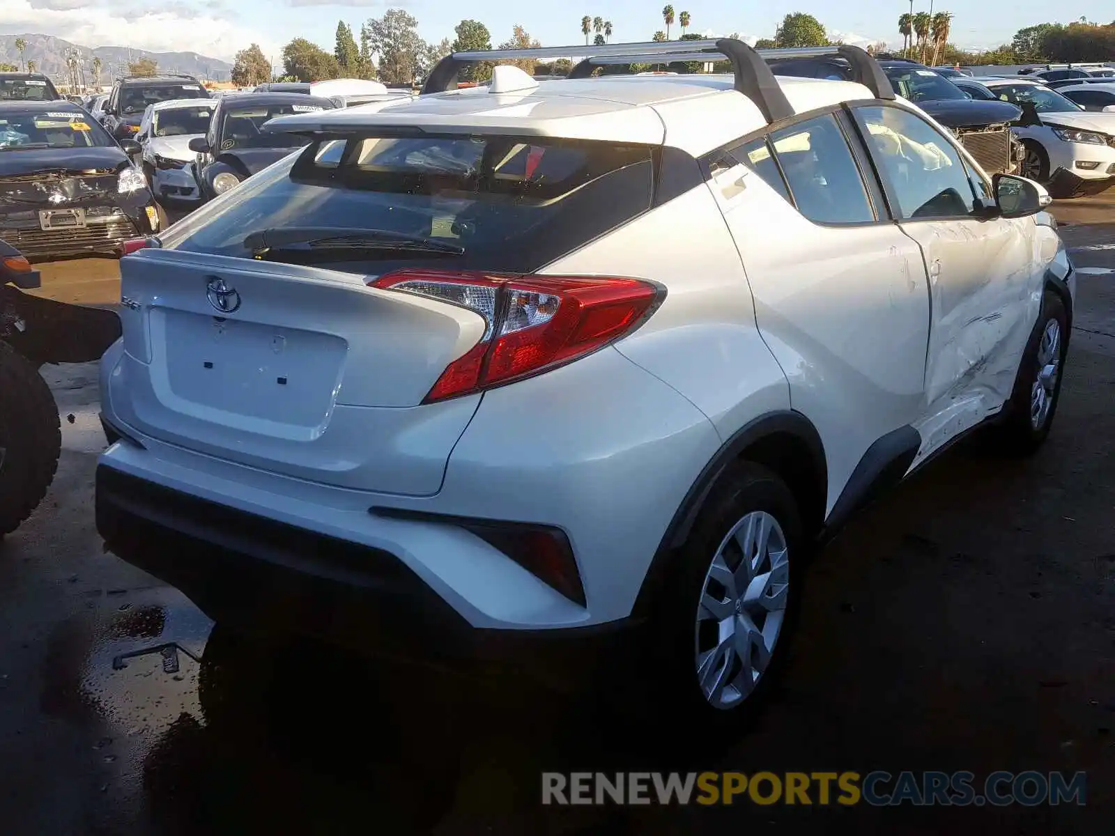 4 Photograph of a damaged car JTNKHMBX8K1043335 TOYOTA C-HR XLE 2019