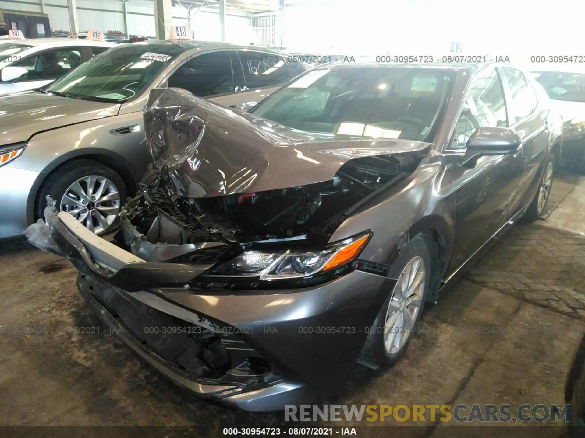 2 Photograph of a damaged car 000B11HK1KU215105 TOYOTA CAMRY 2019