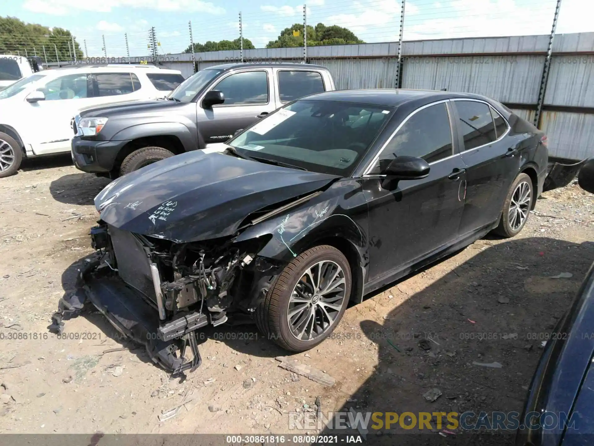 2 Photograph of a damaged car 4T1B118K5KU681250 TOYOTA CAMRY 2019