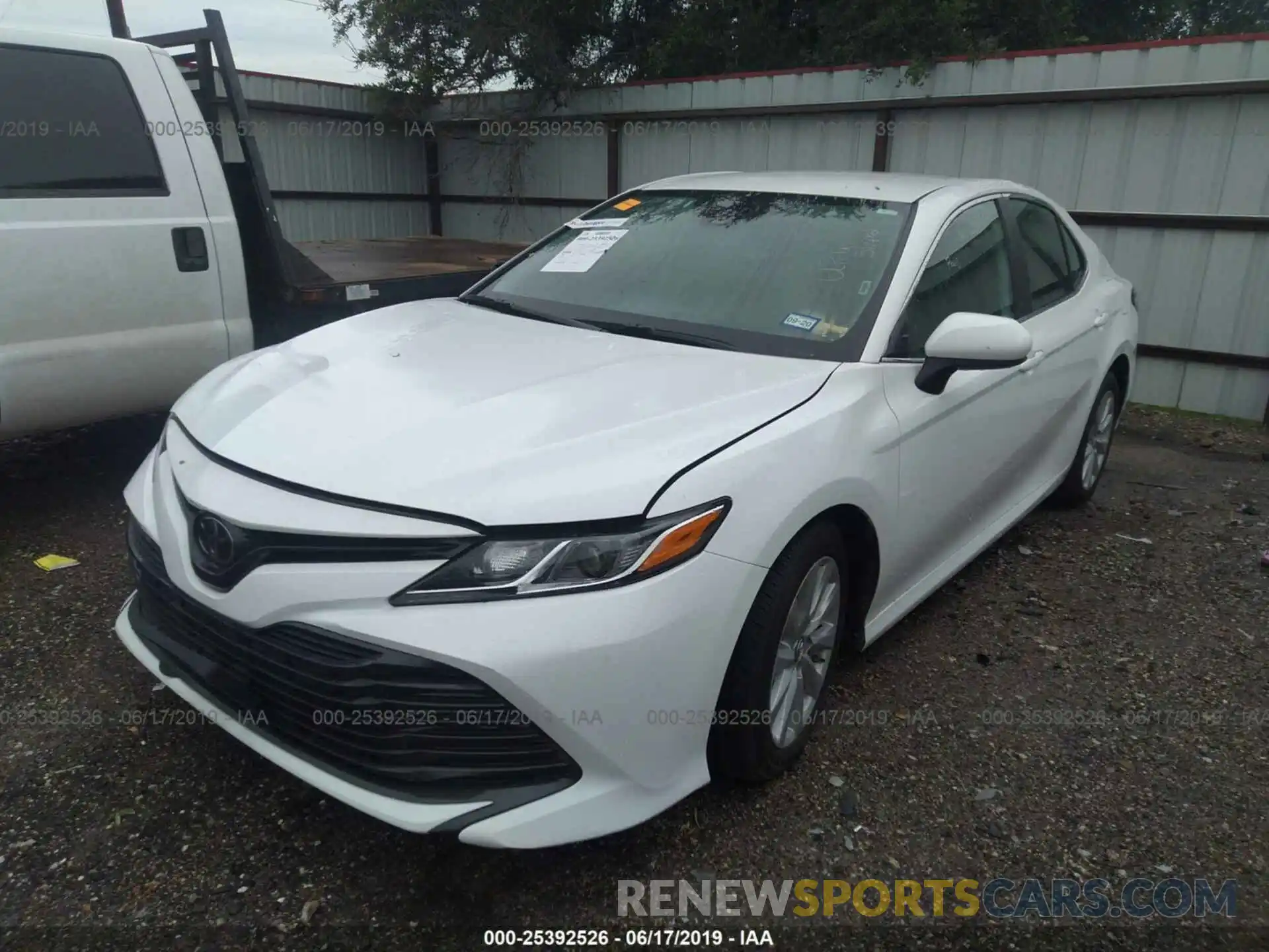 2 Photograph of a damaged car 4T1B11HK0KU160890 TOYOTA CAMRY 2019