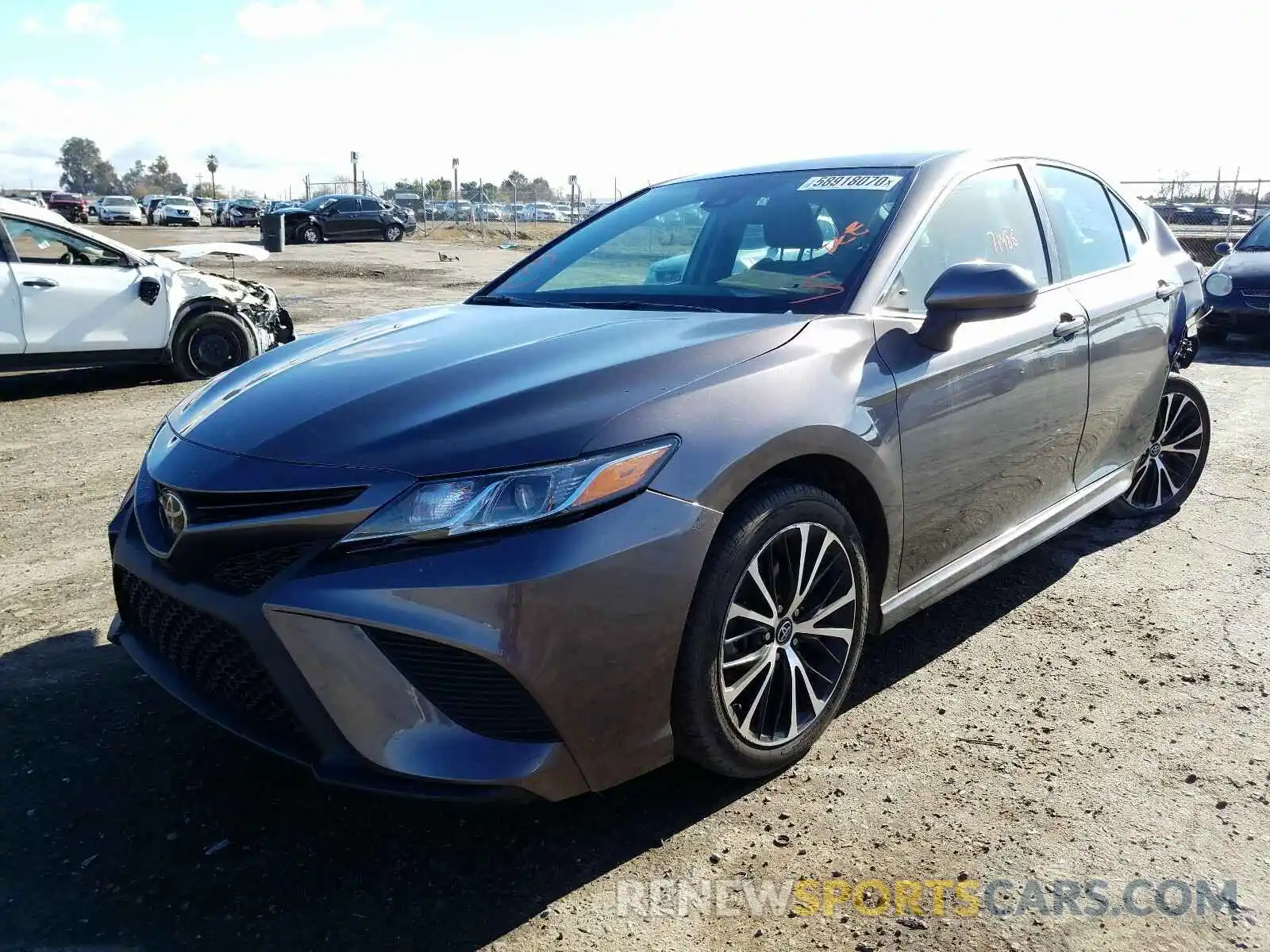 2 Photograph of a damaged car 4T1B11HK0KU163210 TOYOTA CAMRY 2019