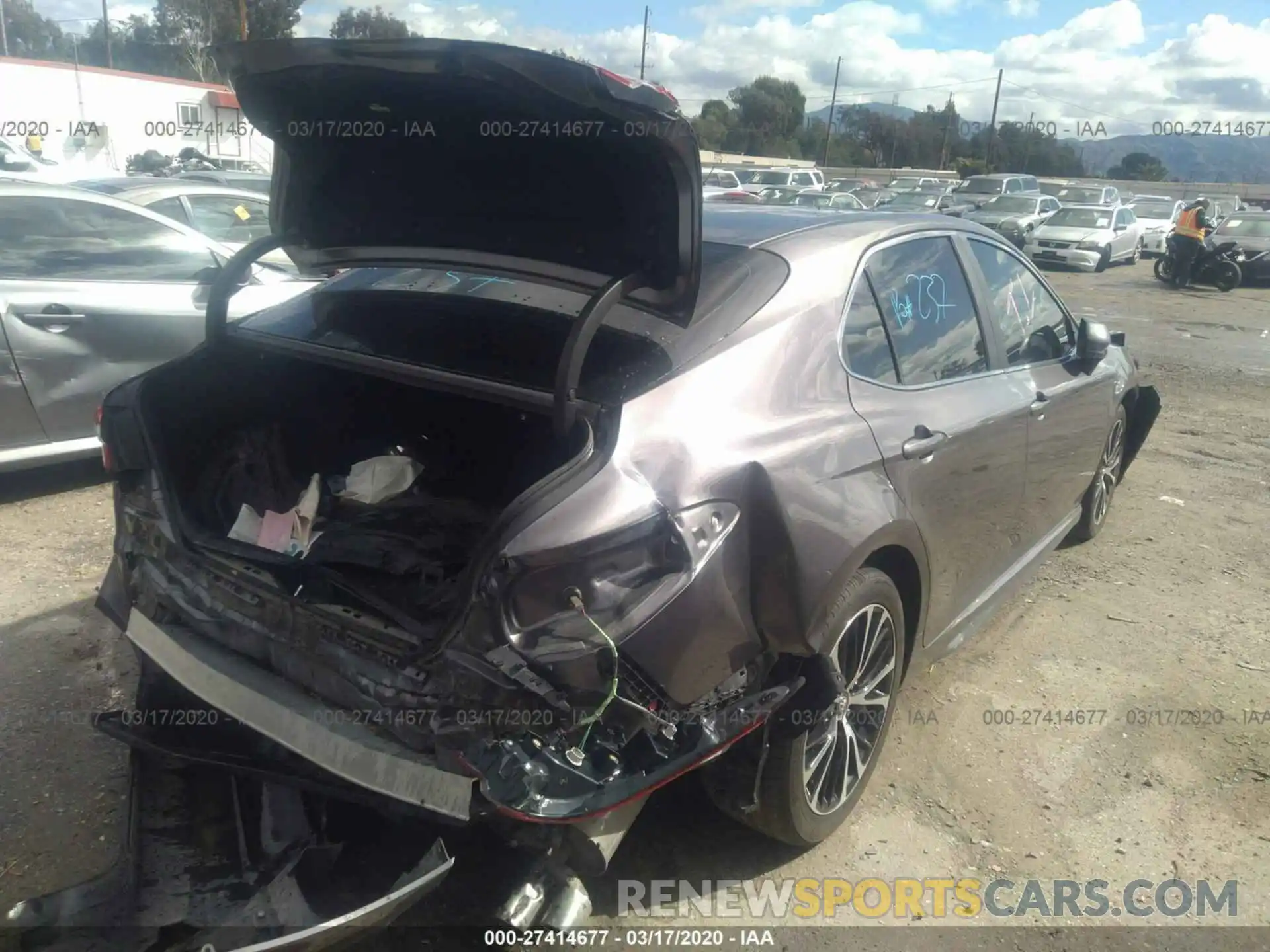 4 Photograph of a damaged car 4T1B11HK0KU163272 TOYOTA CAMRY 2019