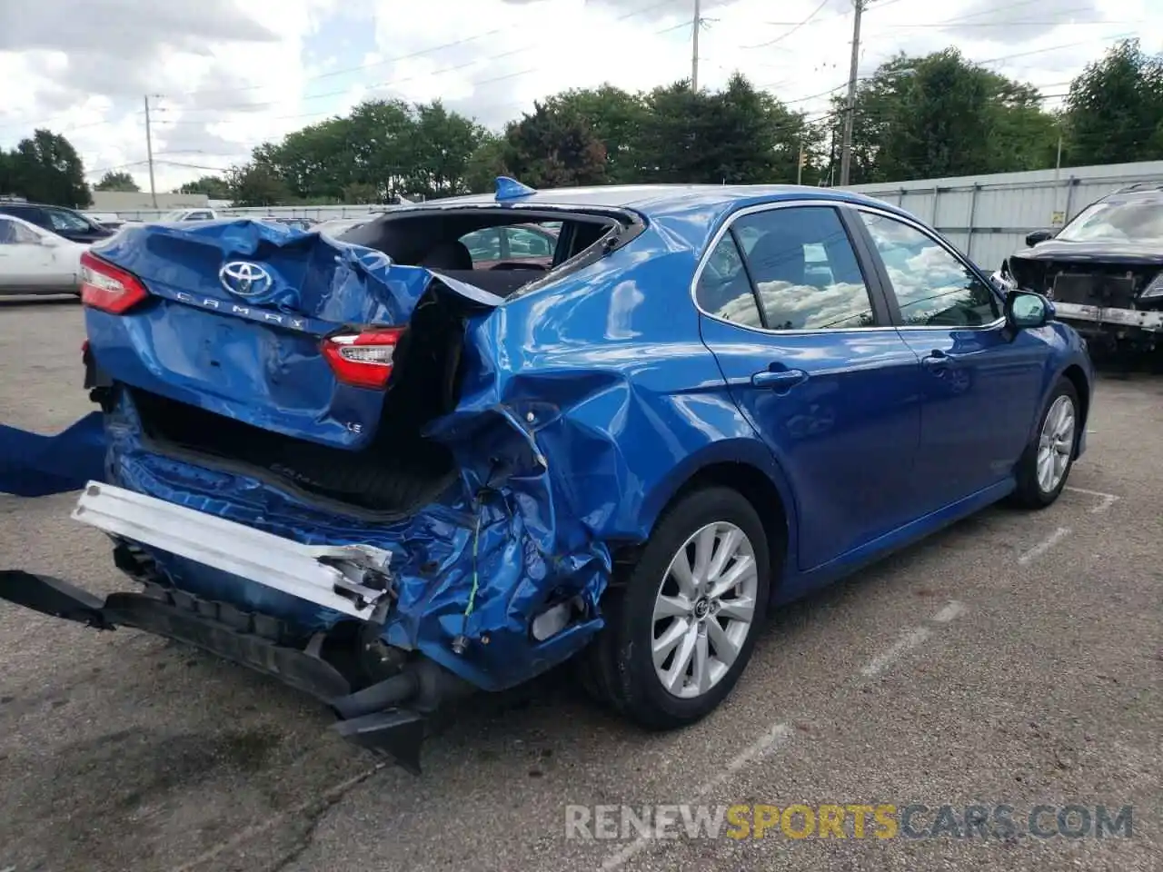 4 Photograph of a damaged car 4T1B11HK0KU164986 TOYOTA CAMRY 2019