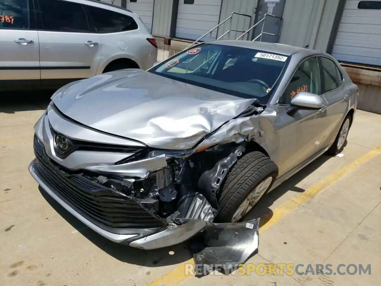 2 Photograph of a damaged car 4T1B11HK0KU165569 TOYOTA CAMRY 2019