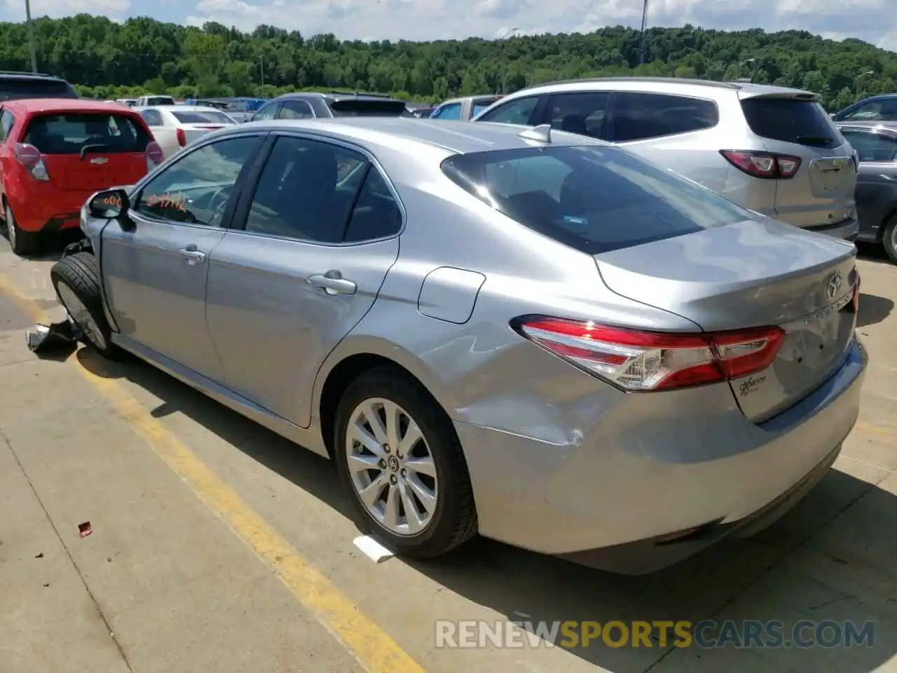 3 Photograph of a damaged car 4T1B11HK0KU165569 TOYOTA CAMRY 2019