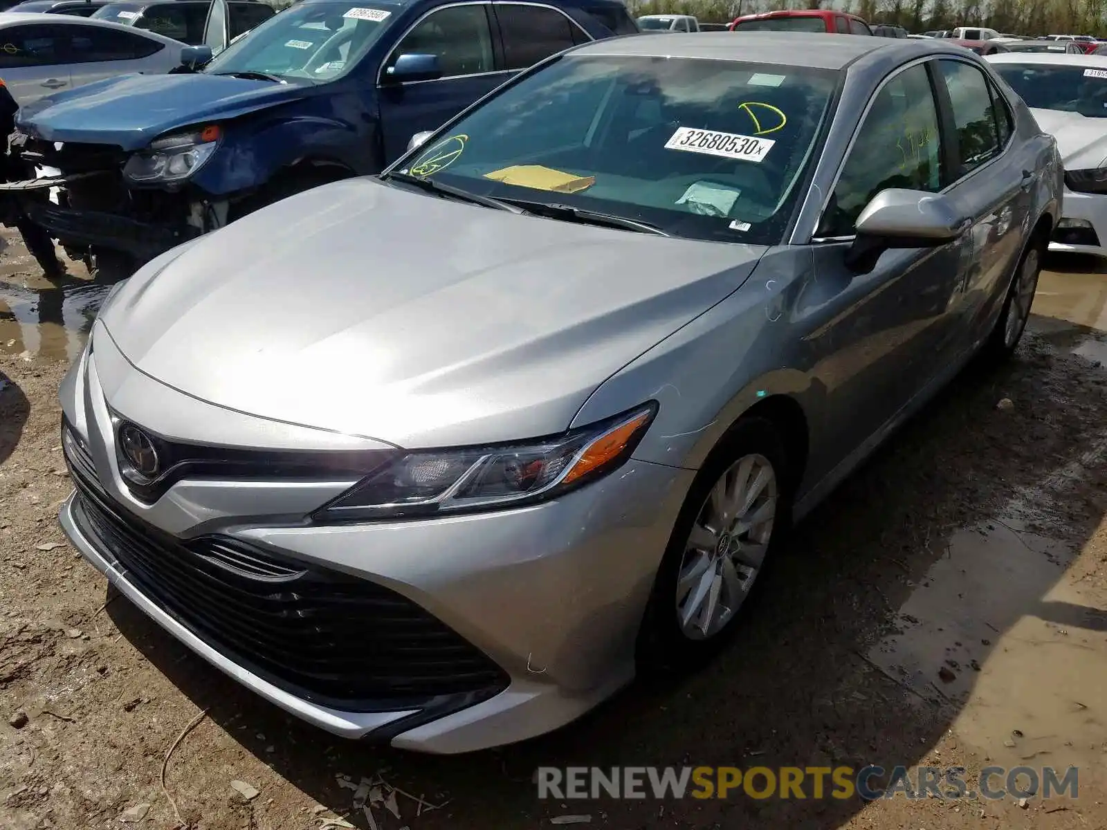 2 Photograph of a damaged car 4T1B11HK0KU165717 TOYOTA CAMRY 2019