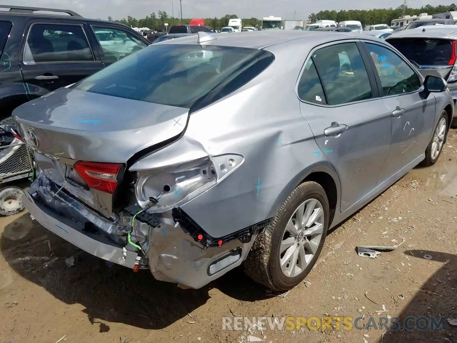 4 Photograph of a damaged car 4T1B11HK0KU165717 TOYOTA CAMRY 2019