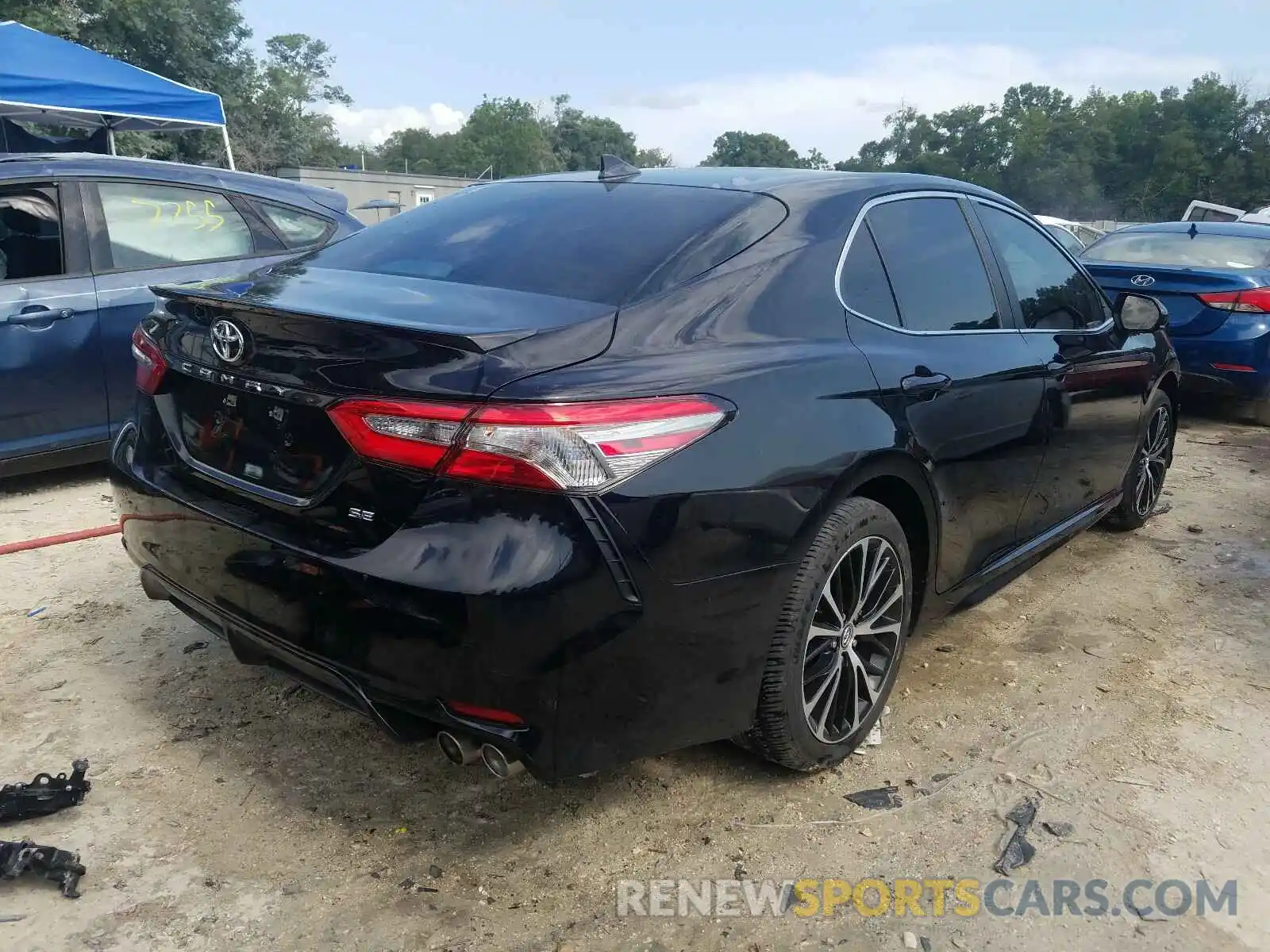 4 Photograph of a damaged car 4T1B11HK0KU167693 TOYOTA CAMRY 2019