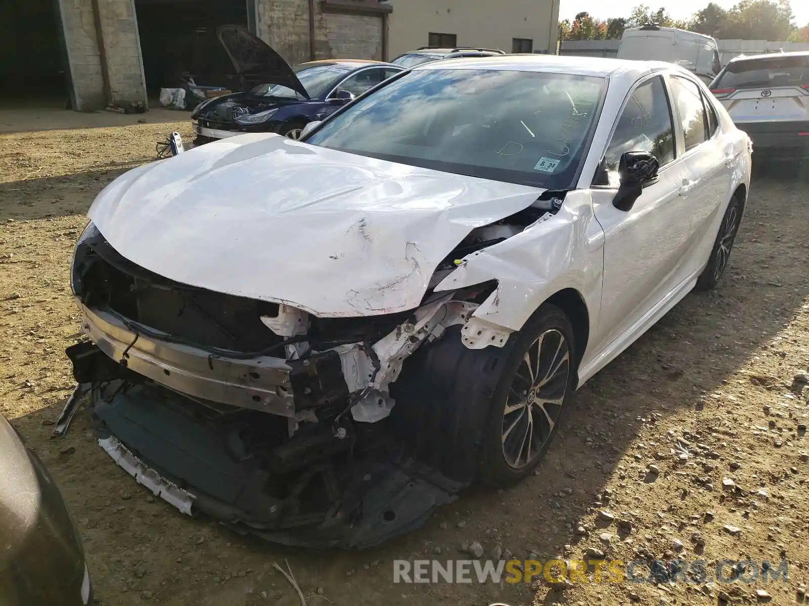 2 Photograph of a damaged car 4T1B11HK0KU169198 TOYOTA CAMRY 2019