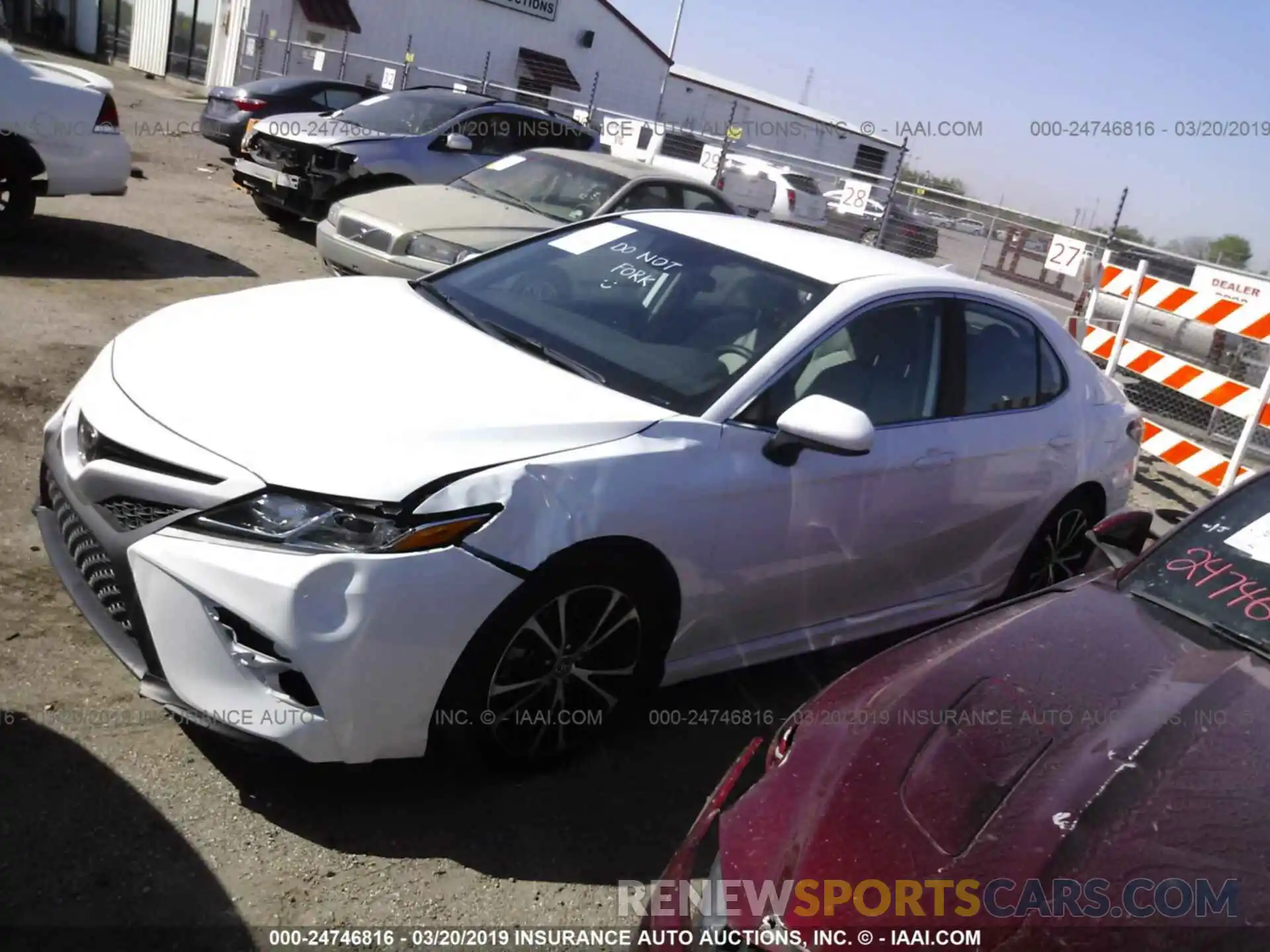 2 Photograph of a damaged car 4T1B11HK0KU169217 TOYOTA CAMRY 2019