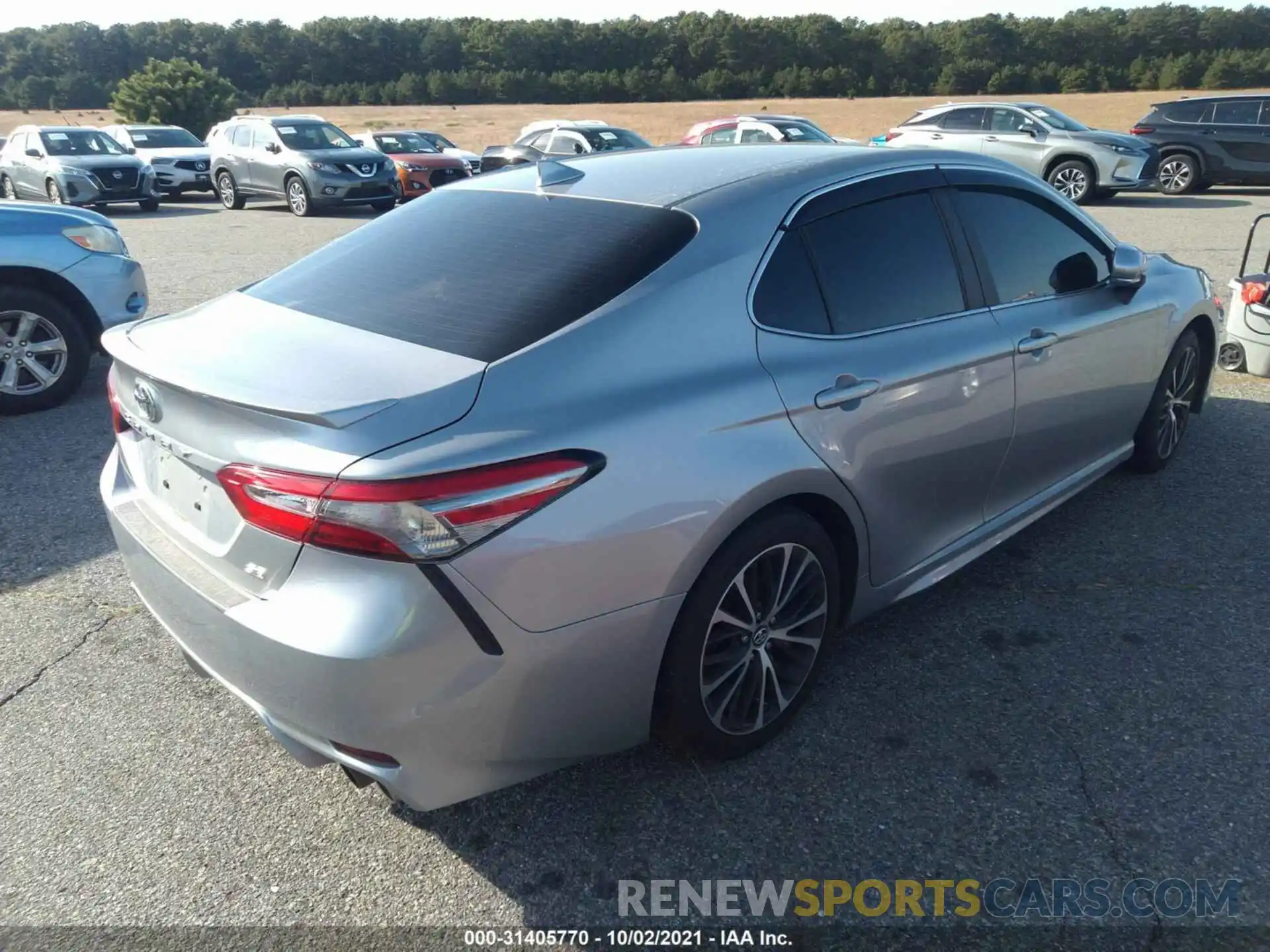 4 Photograph of a damaged car 4T1B11HK0KU170657 TOYOTA CAMRY 2019