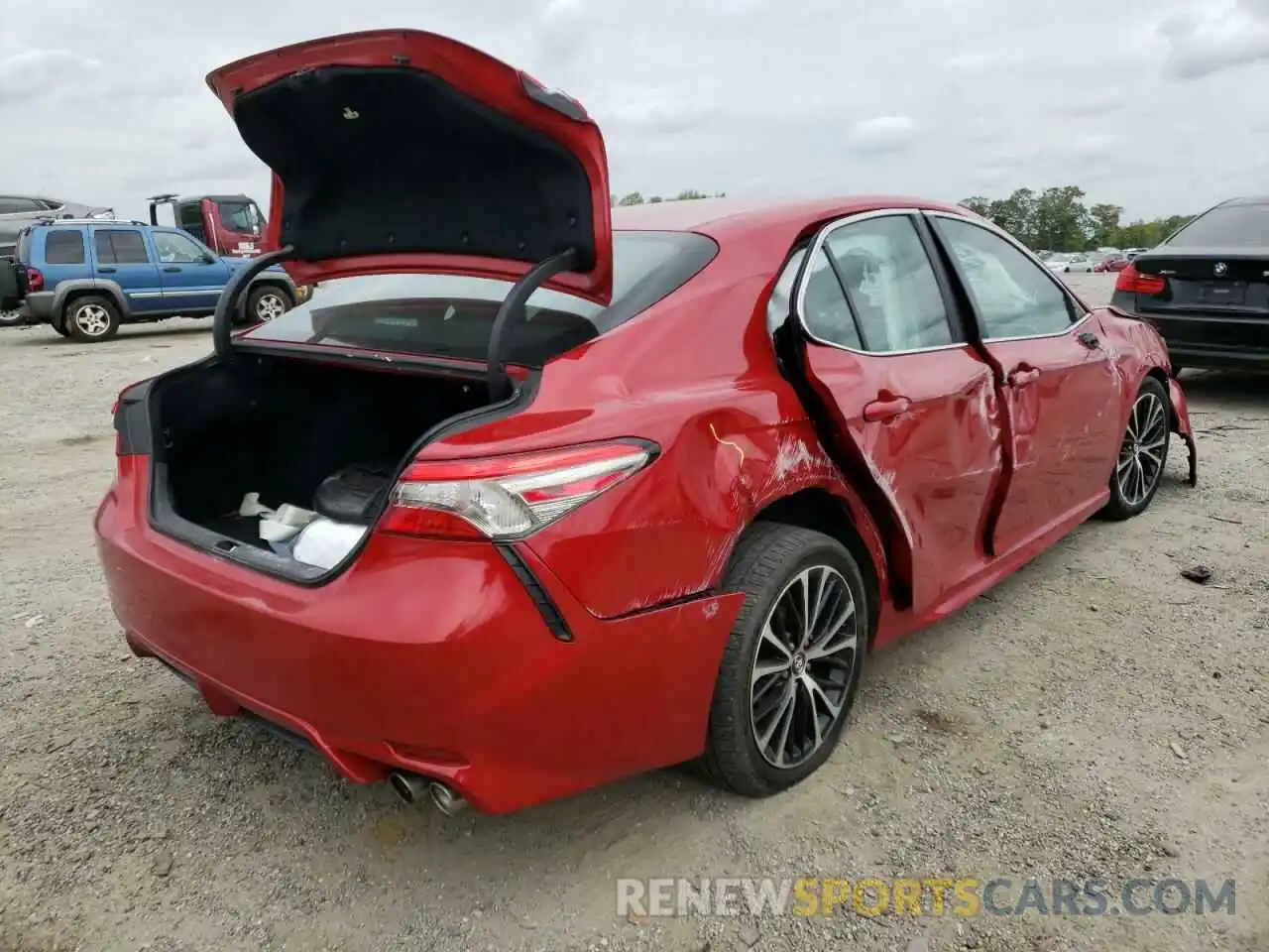 4 Photograph of a damaged car 4T1B11HK0KU171873 TOYOTA CAMRY 2019