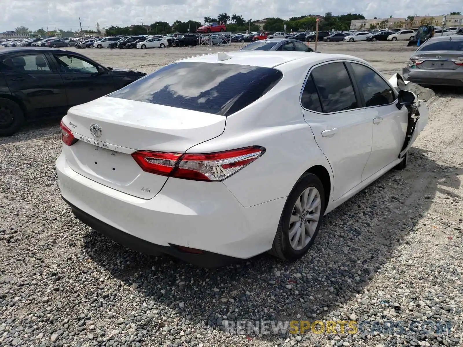 4 Photograph of a damaged car 4T1B11HK0KU172652 TOYOTA CAMRY 2019