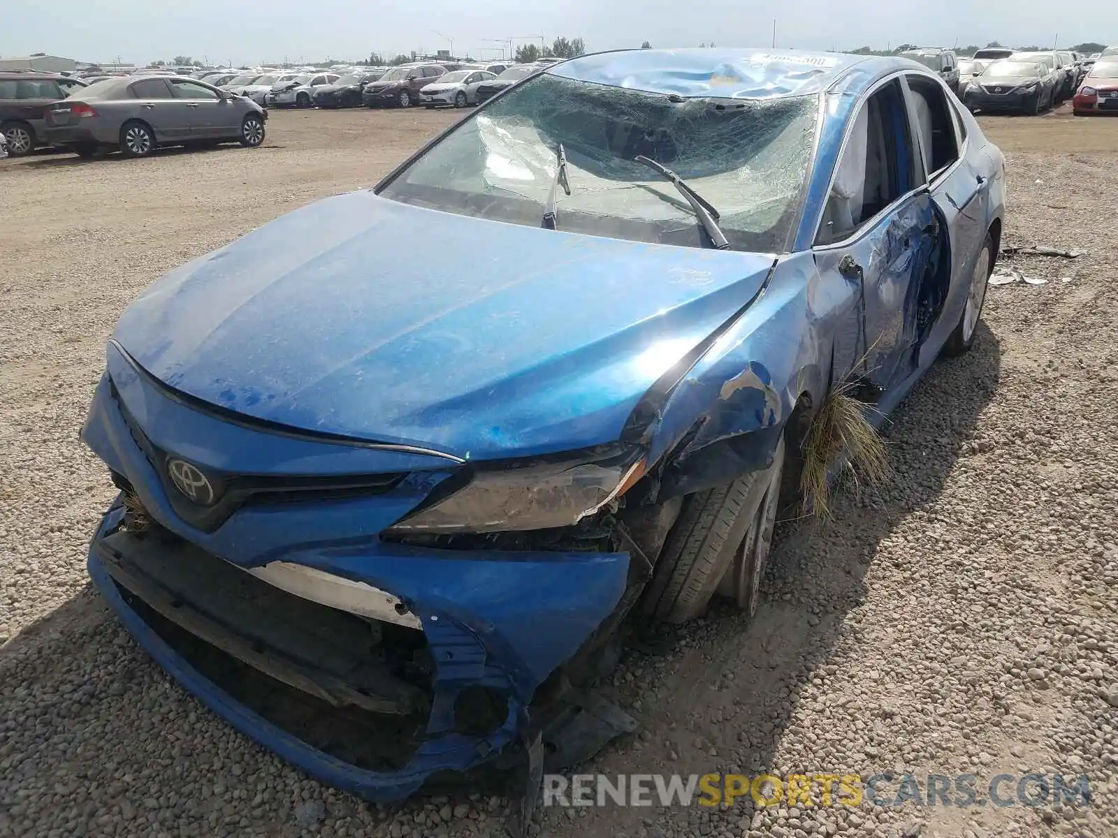 2 Photograph of a damaged car 4T1B11HK0KU174207 TOYOTA CAMRY 2019