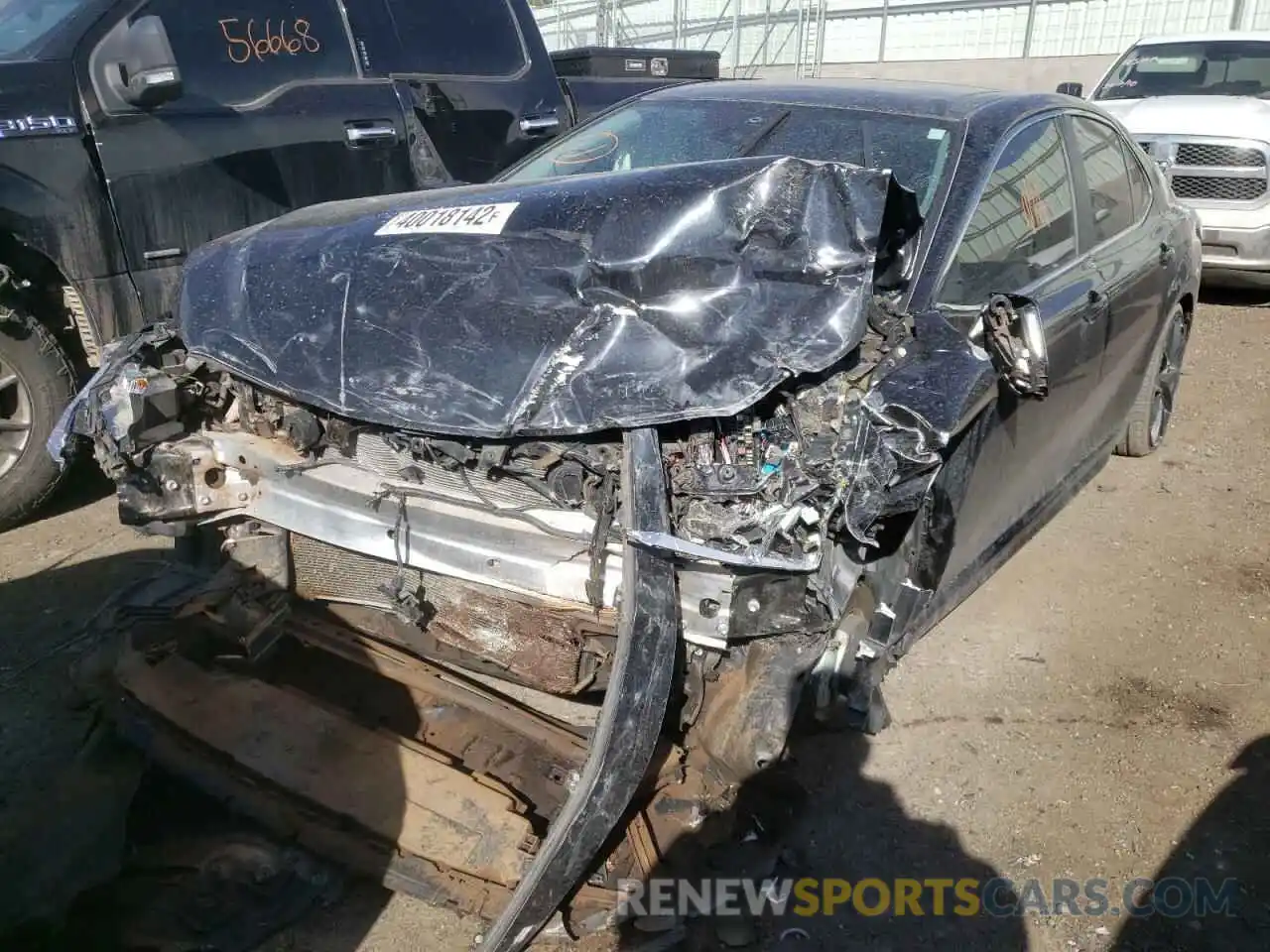 2 Photograph of a damaged car 4T1B11HK0KU174238 TOYOTA CAMRY 2019