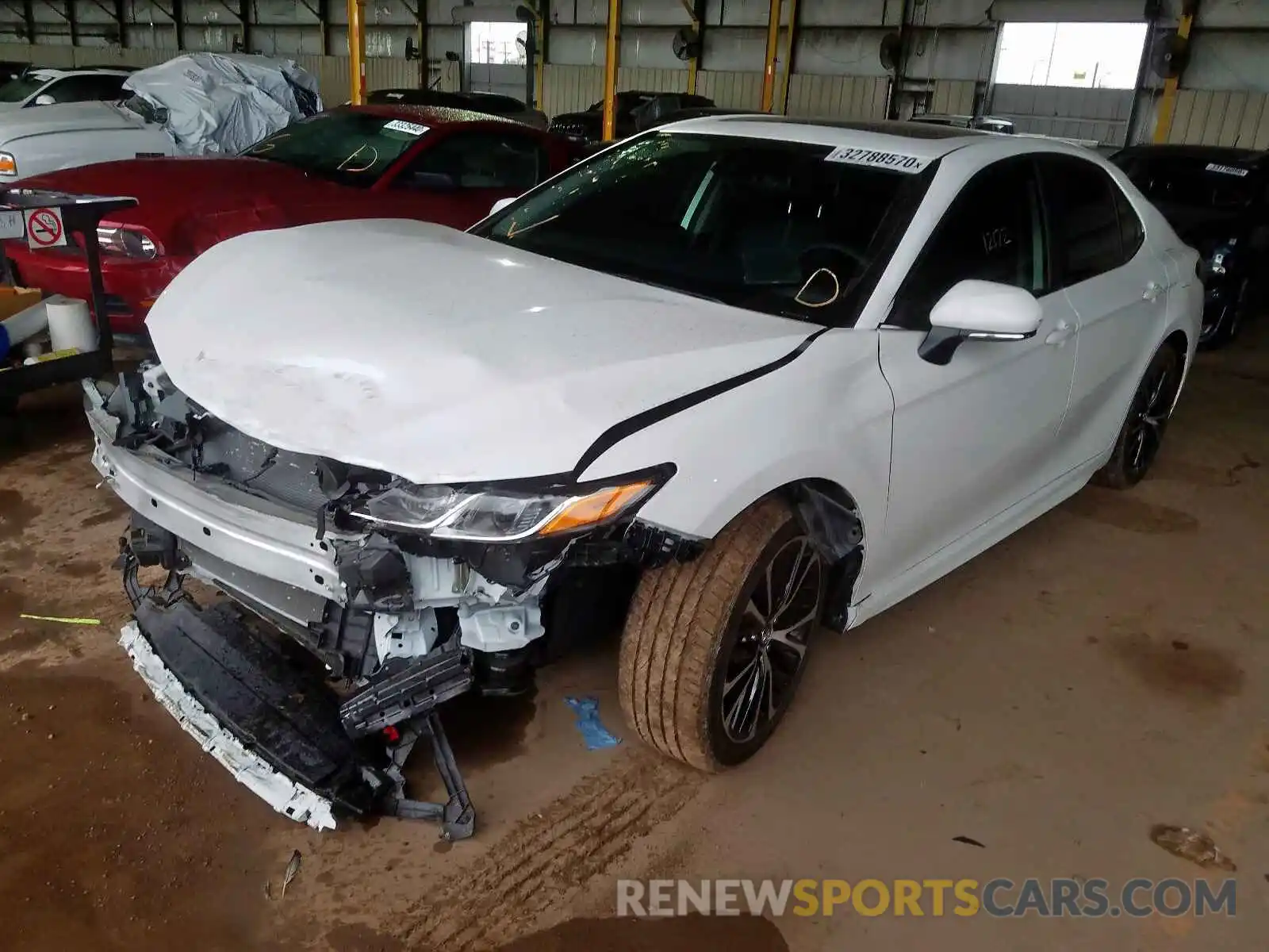 2 Photograph of a damaged car 4T1B11HK0KU174465 TOYOTA CAMRY 2019