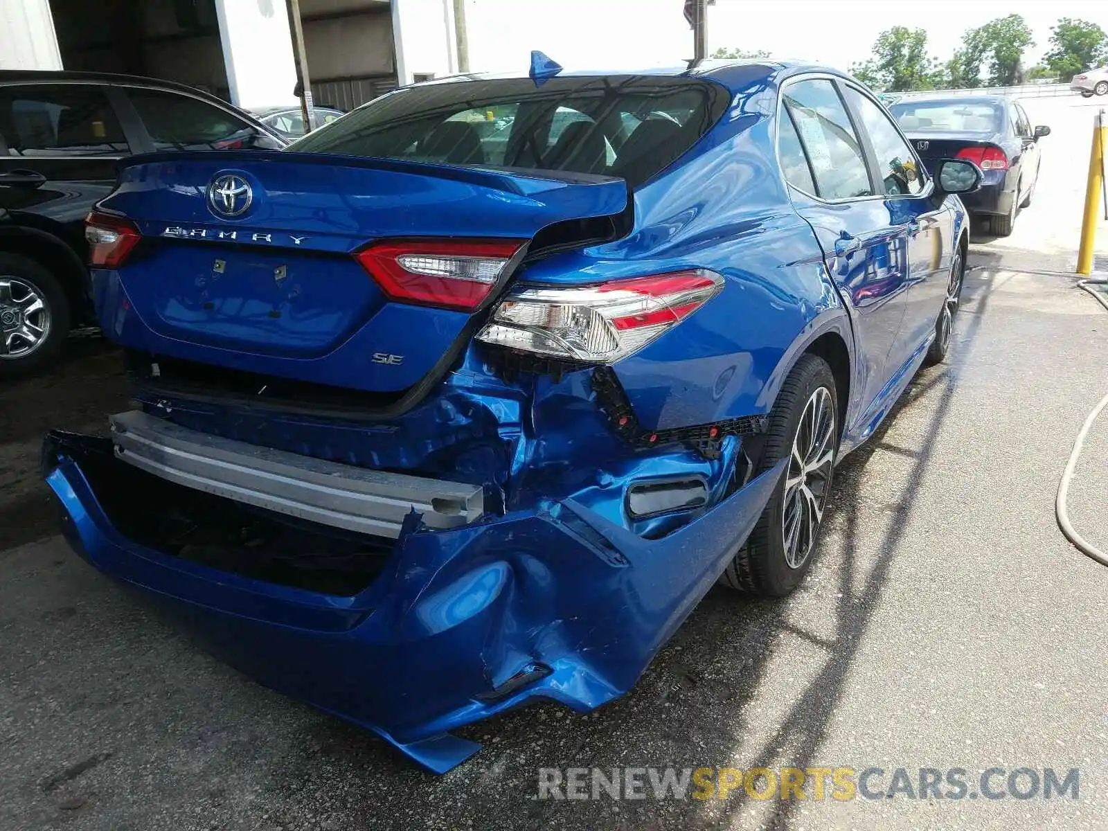 4 Photograph of a damaged car 4T1B11HK0KU174577 TOYOTA CAMRY 2019