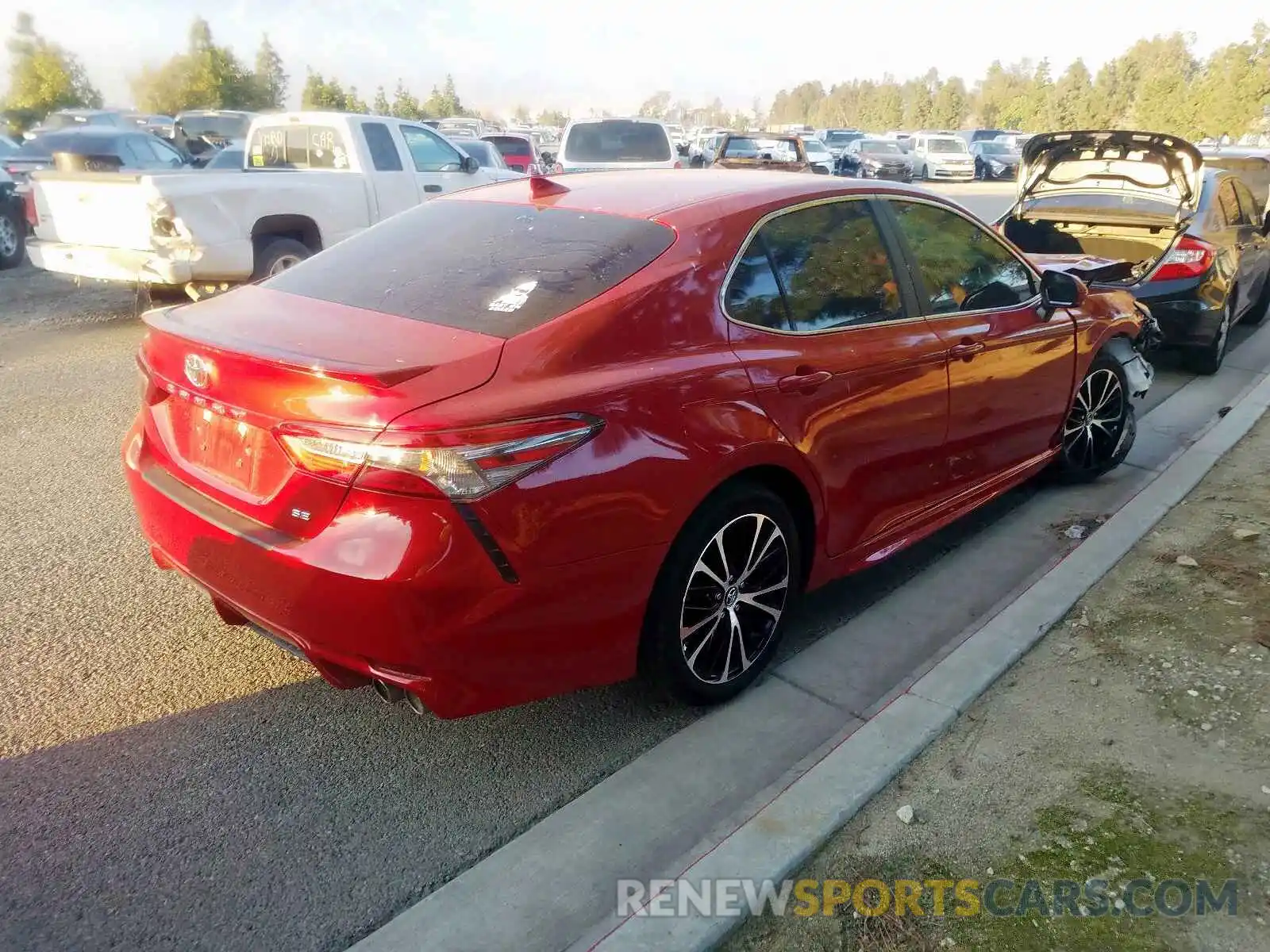 4 Photograph of a damaged car 4T1B11HK0KU174921 TOYOTA CAMRY 2019