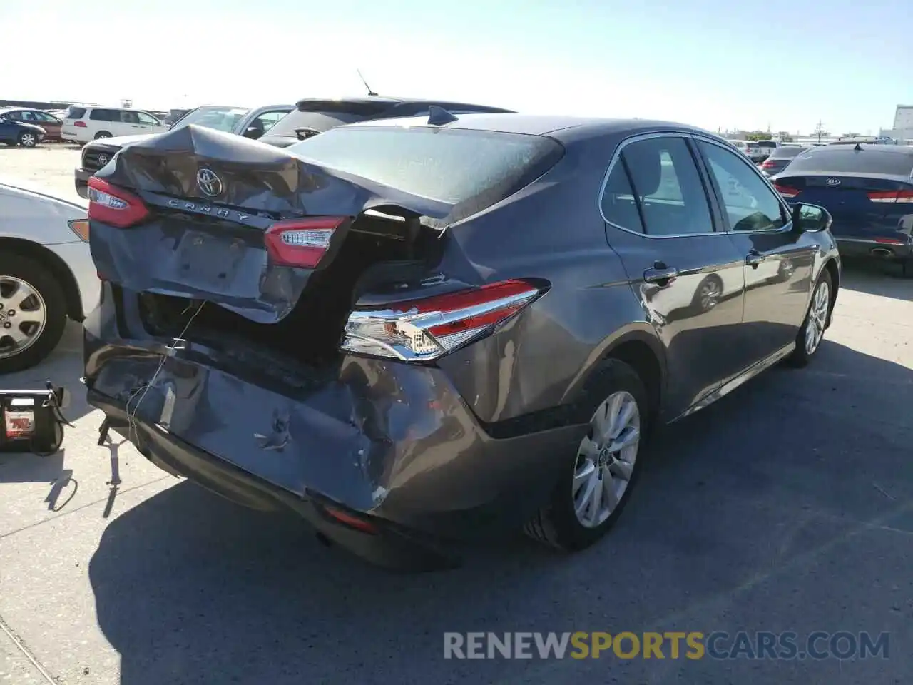 4 Photograph of a damaged car 4T1B11HK0KU178810 TOYOTA CAMRY 2019