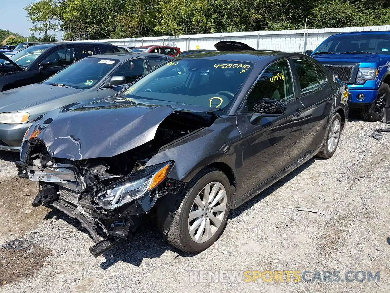 2 Photograph of a damaged car 4T1B11HK0KU181044 TOYOTA CAMRY 2019