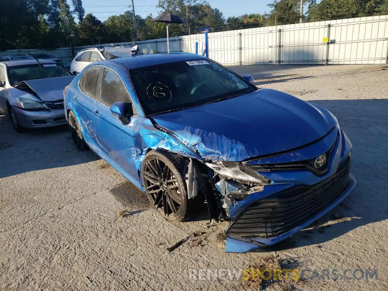 1 Photograph of a damaged car 4T1B11HK0KU182033 TOYOTA CAMRY 2019