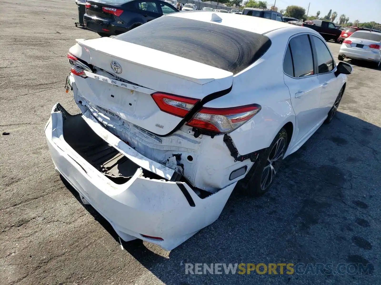 4 Photograph of a damaged car 4T1B11HK0KU186390 TOYOTA CAMRY 2019