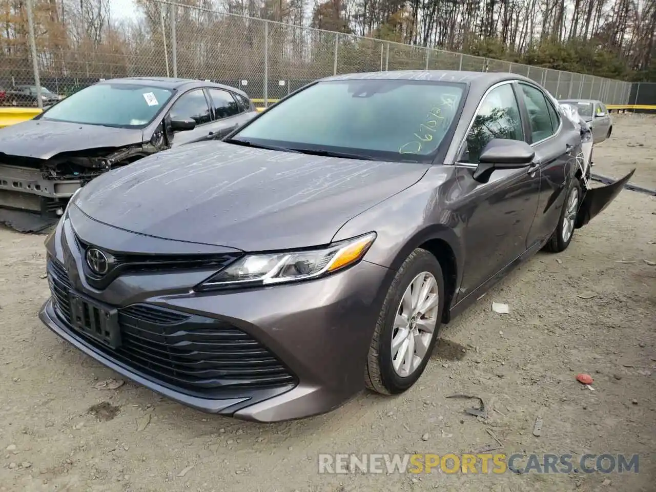 2 Photograph of a damaged car 4T1B11HK0KU186955 TOYOTA CAMRY 2019