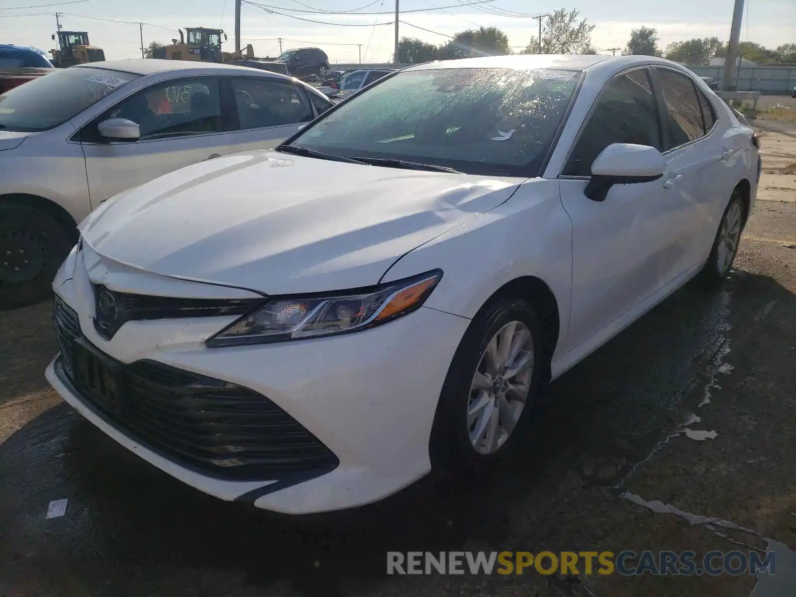 2 Photograph of a damaged car 4T1B11HK0KU188740 TOYOTA CAMRY 2019