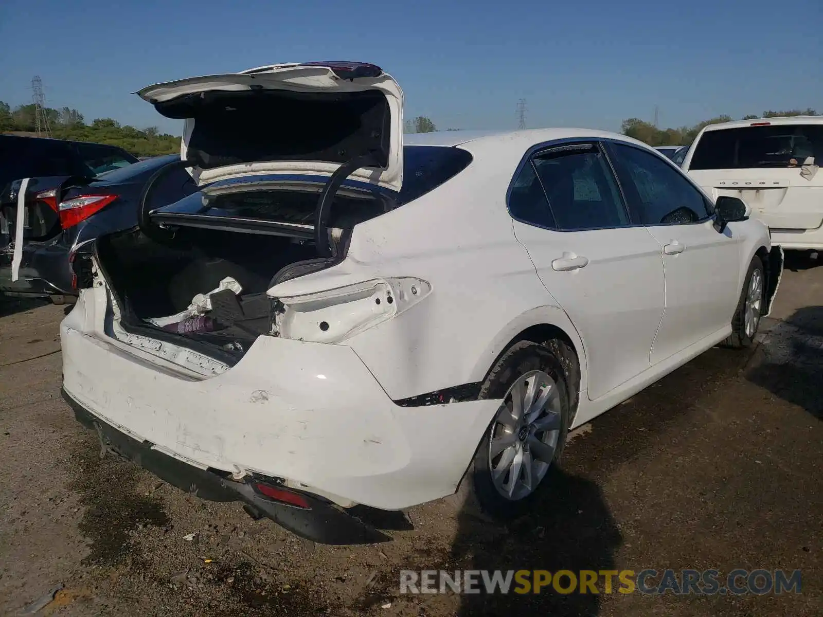 4 Photograph of a damaged car 4T1B11HK0KU188740 TOYOTA CAMRY 2019